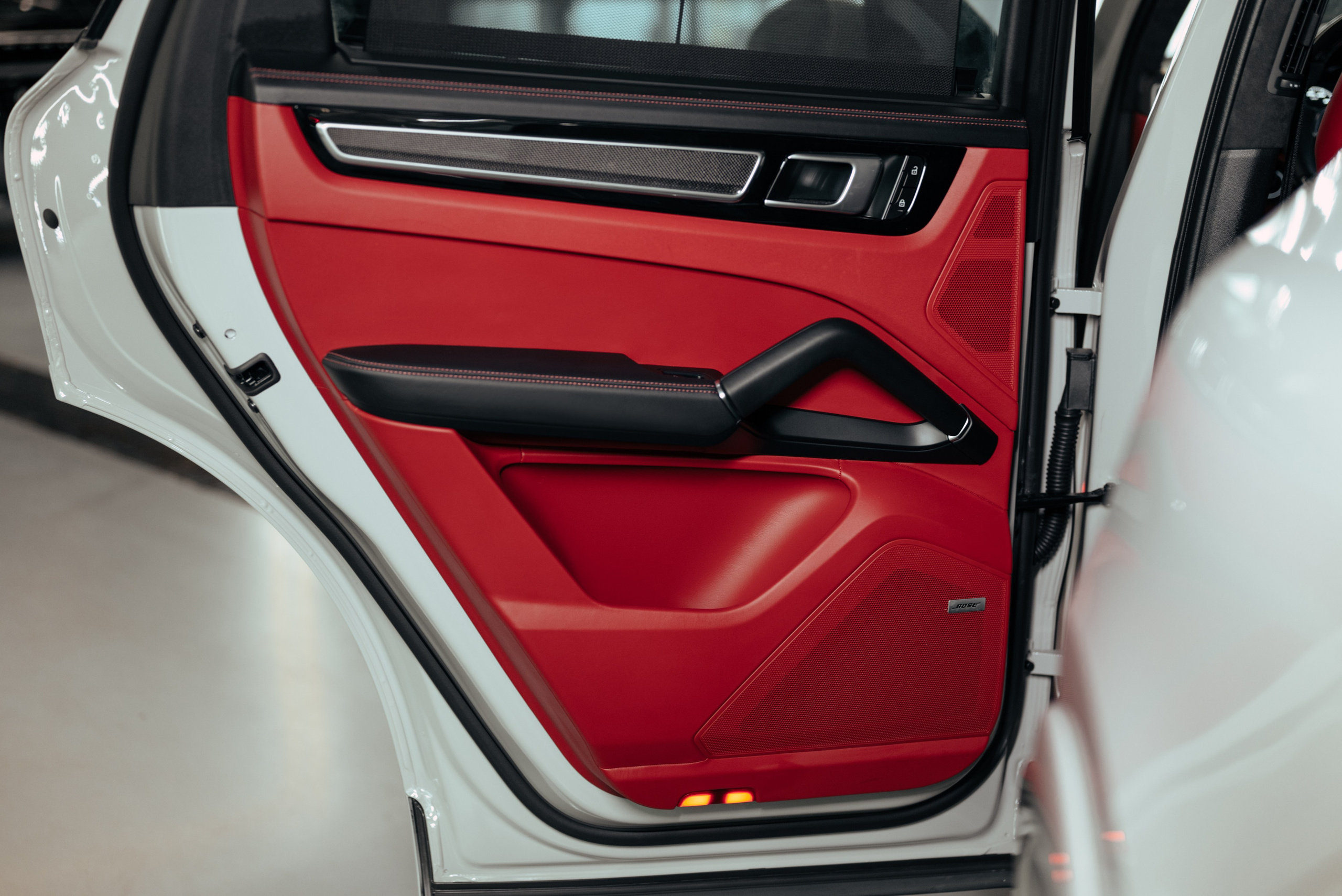 Porsche Cayenne GTS grey on red. DeLorein