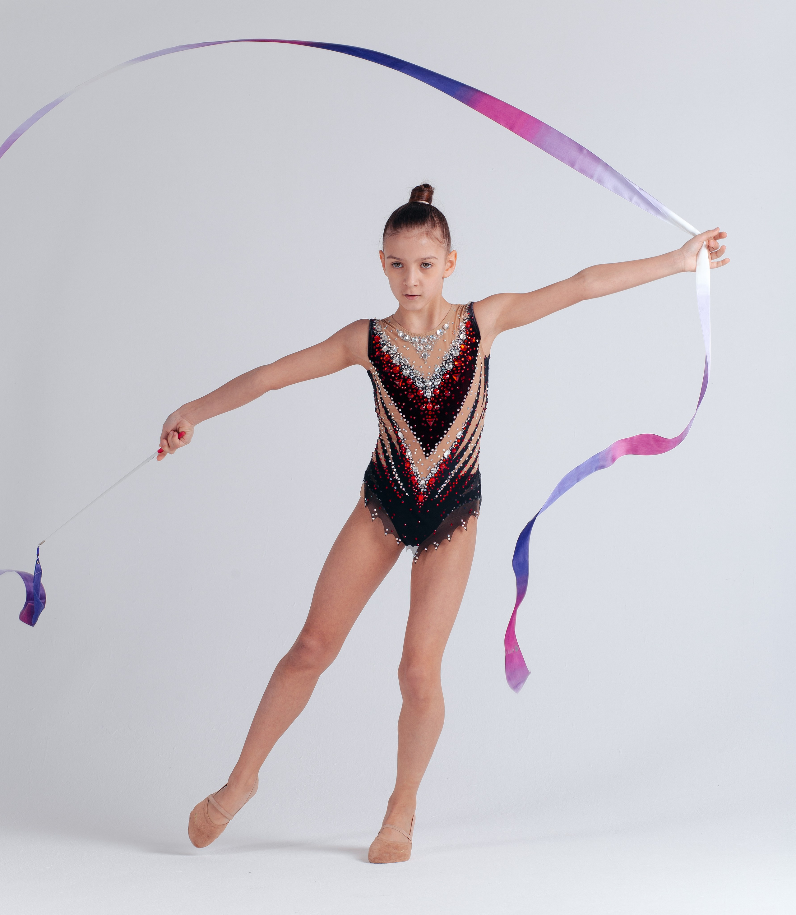 Спортивная фотосессия девочки гимнастки.
