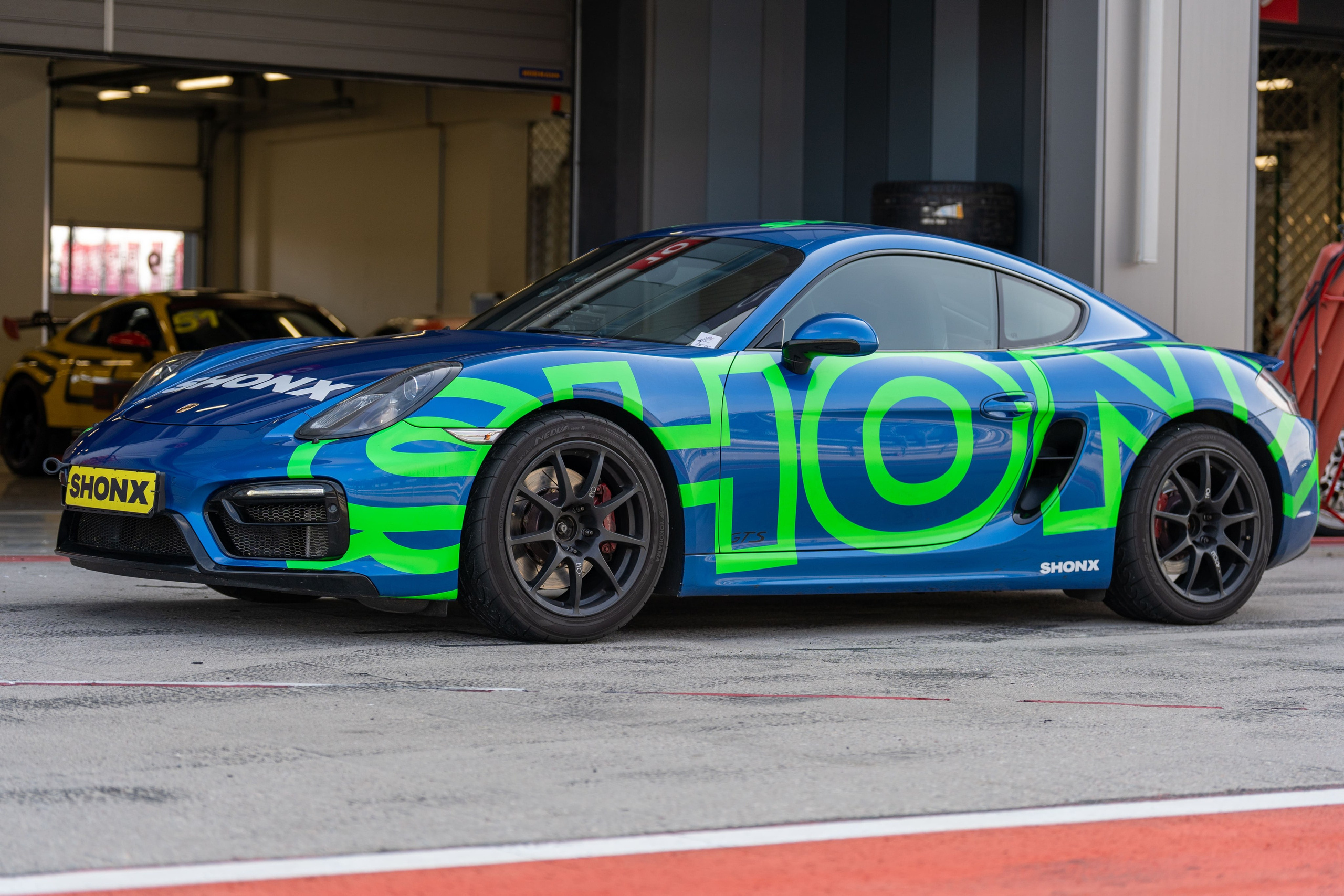 Синий Porsche GTS на трек-дне «Игора Драйв», спортивный фотограф Санкт-Петербург