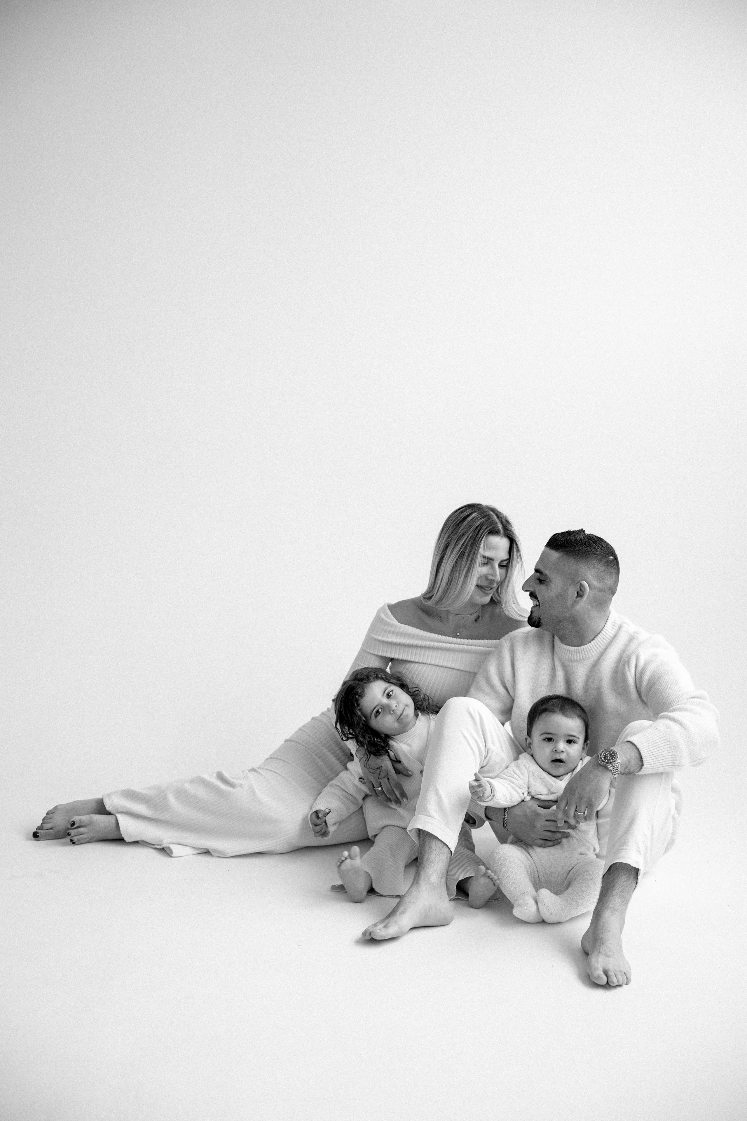 Family photoshoot in White Studio. Wedding and family photographer
