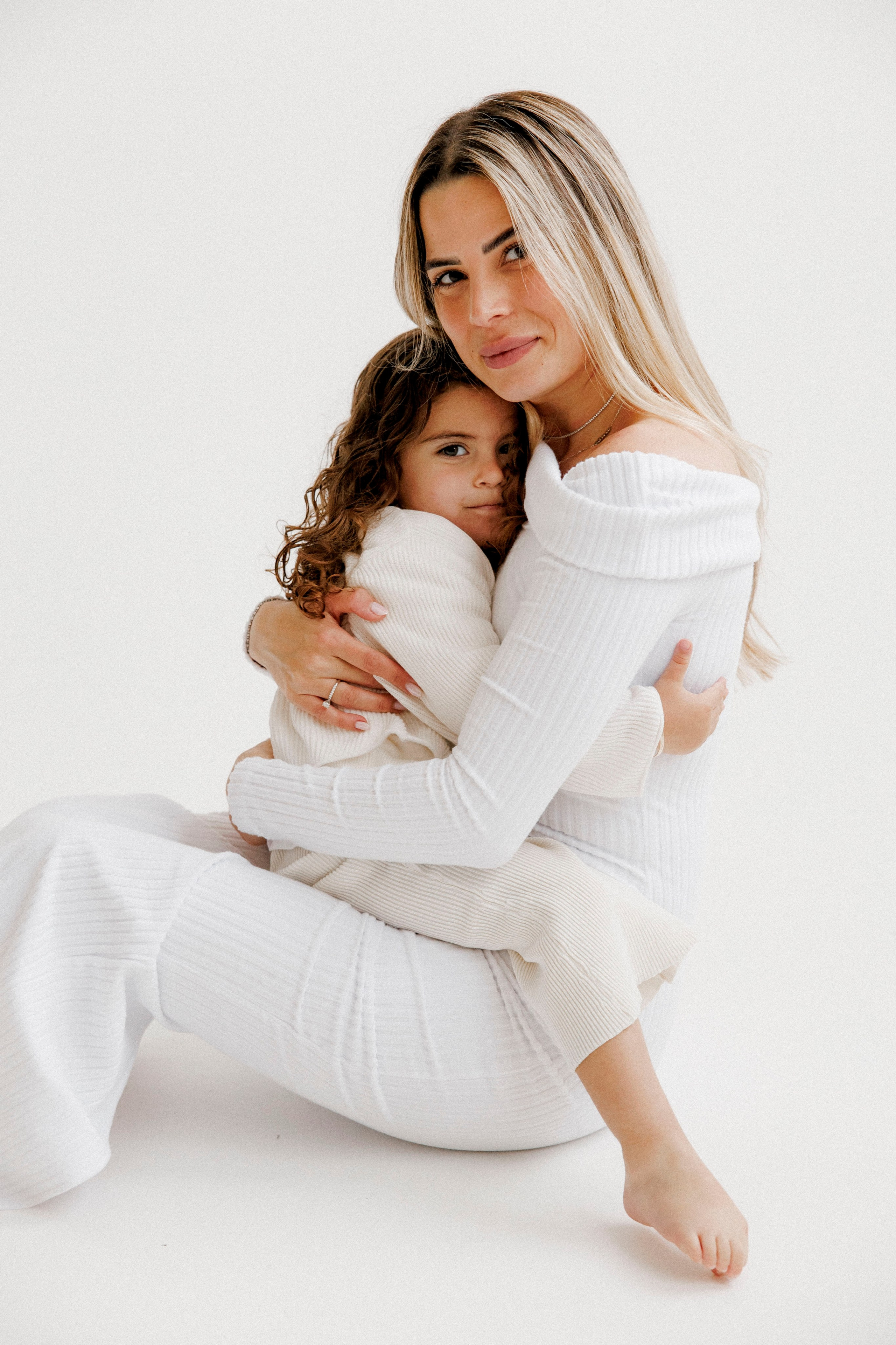 Family photoshoot in White Studio. Wedding and family photographer