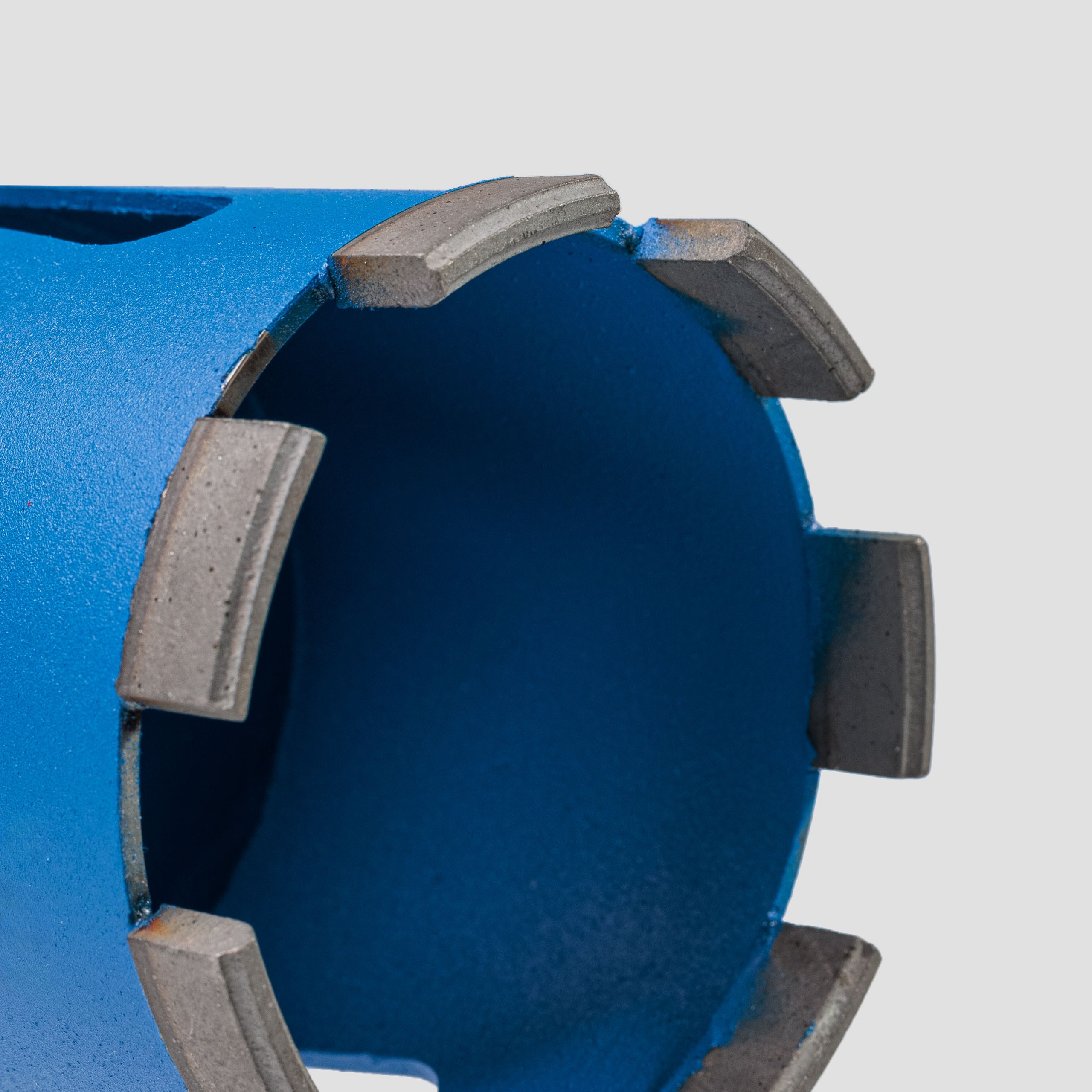 Предметные фотографии шаблонов и коронок для сверления стен