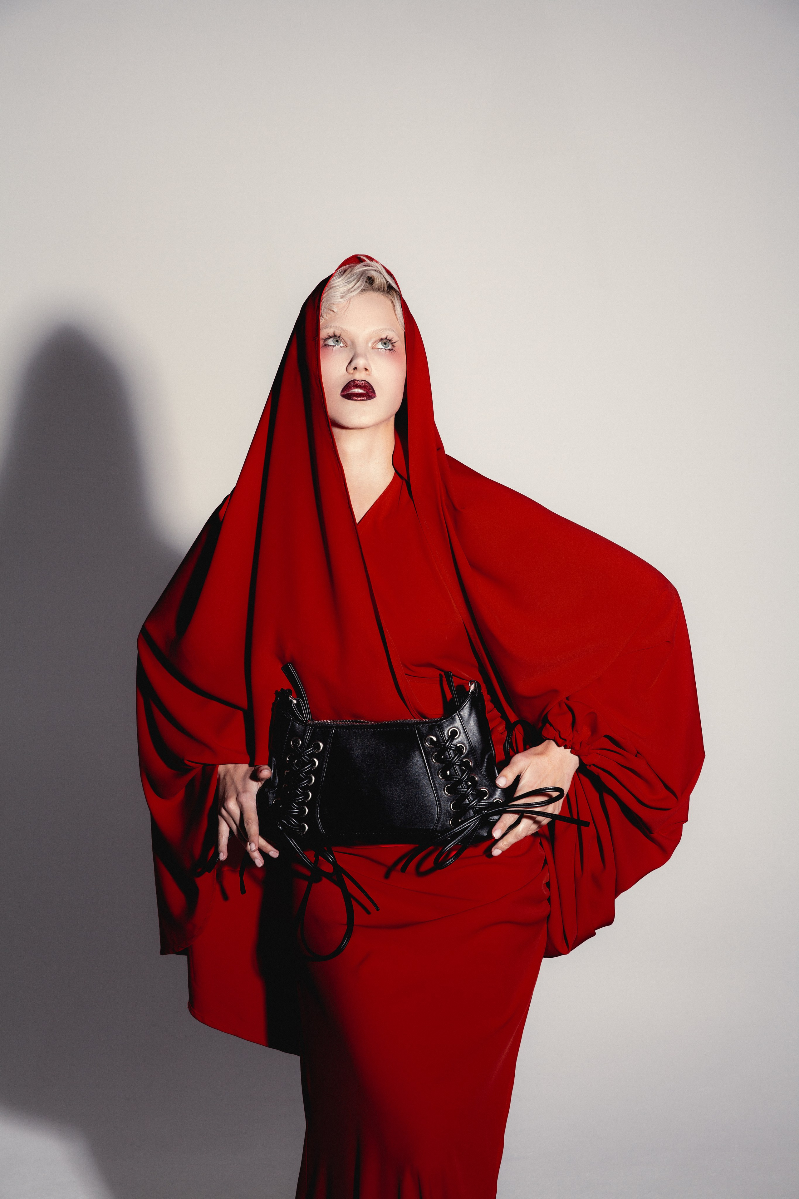 Red. Photographer. Producer. Retoucher