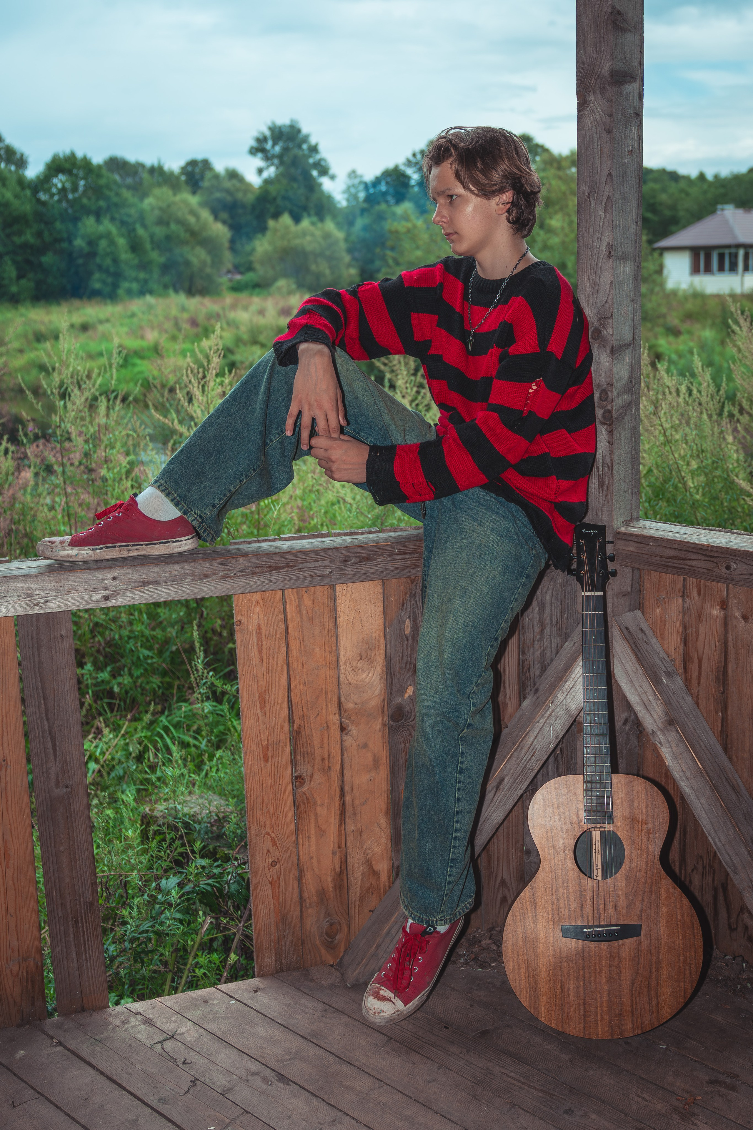 Молодой человек с гитарой