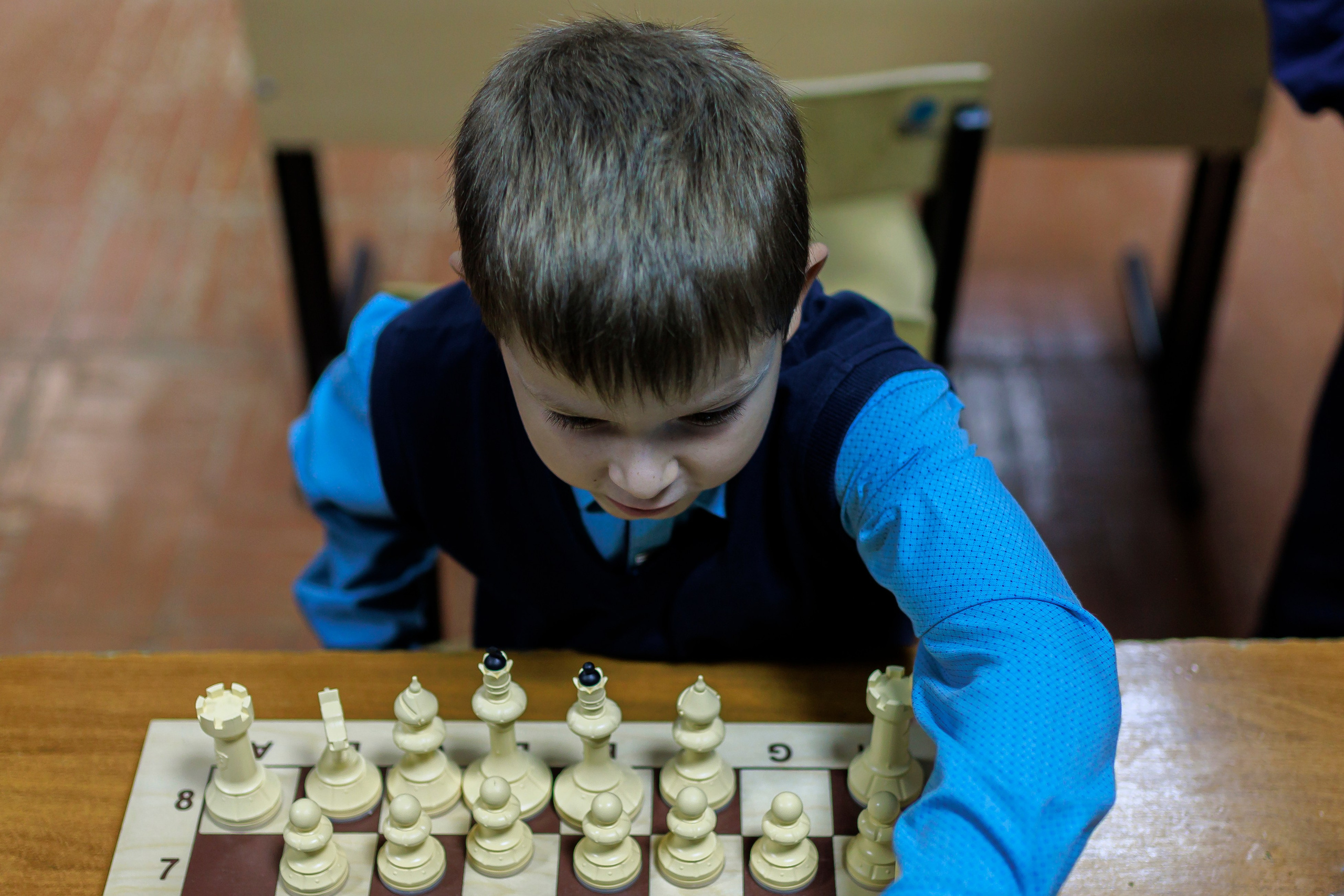Репортажная сьёмка игры в шахматы в детском доме. Семейный и детский фотограф в Рязани Васюгова Мария