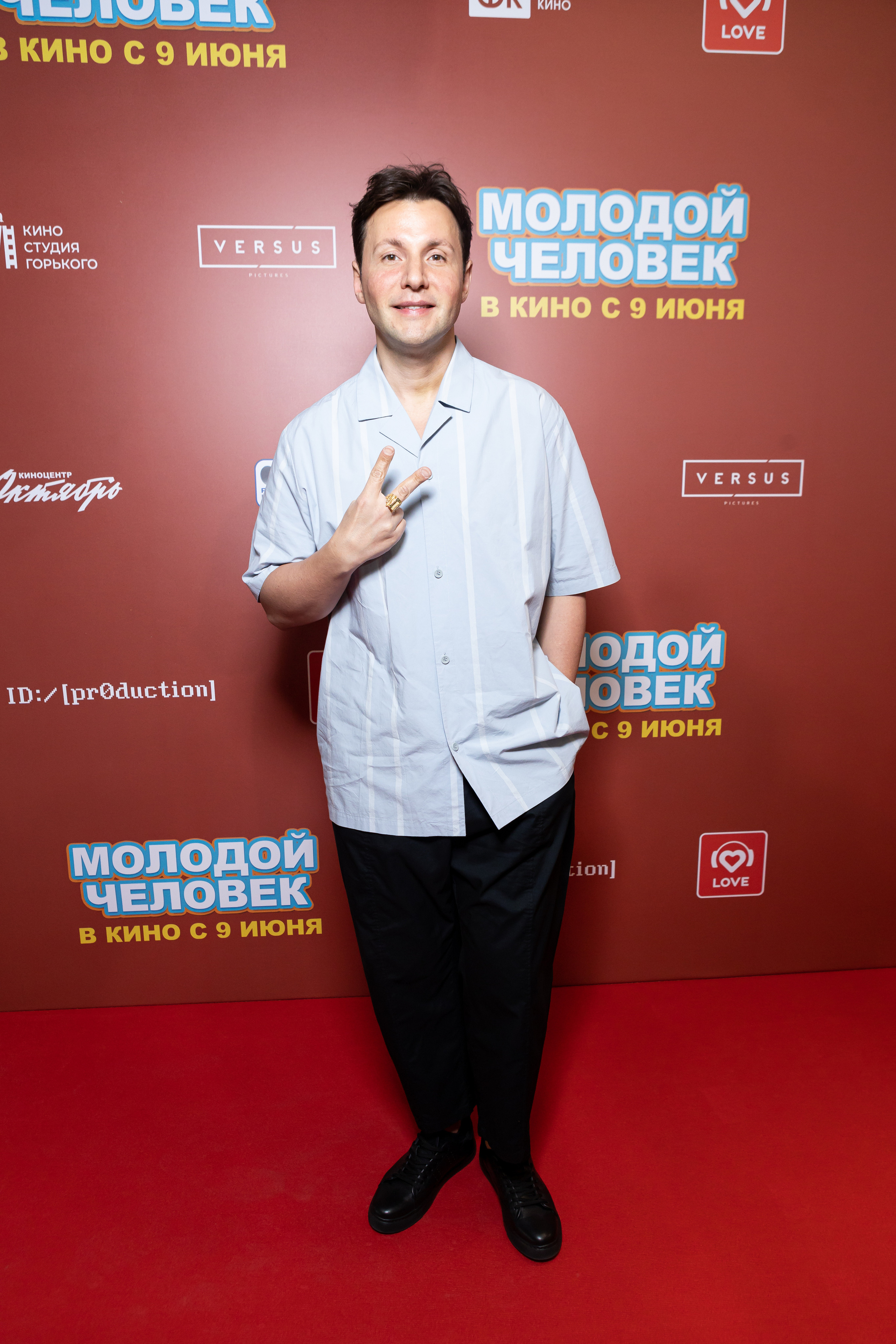 Молодой парень в кинотеатре КАРО ОКТЯБРЬ. Светский фотограф — Анисина Ирина