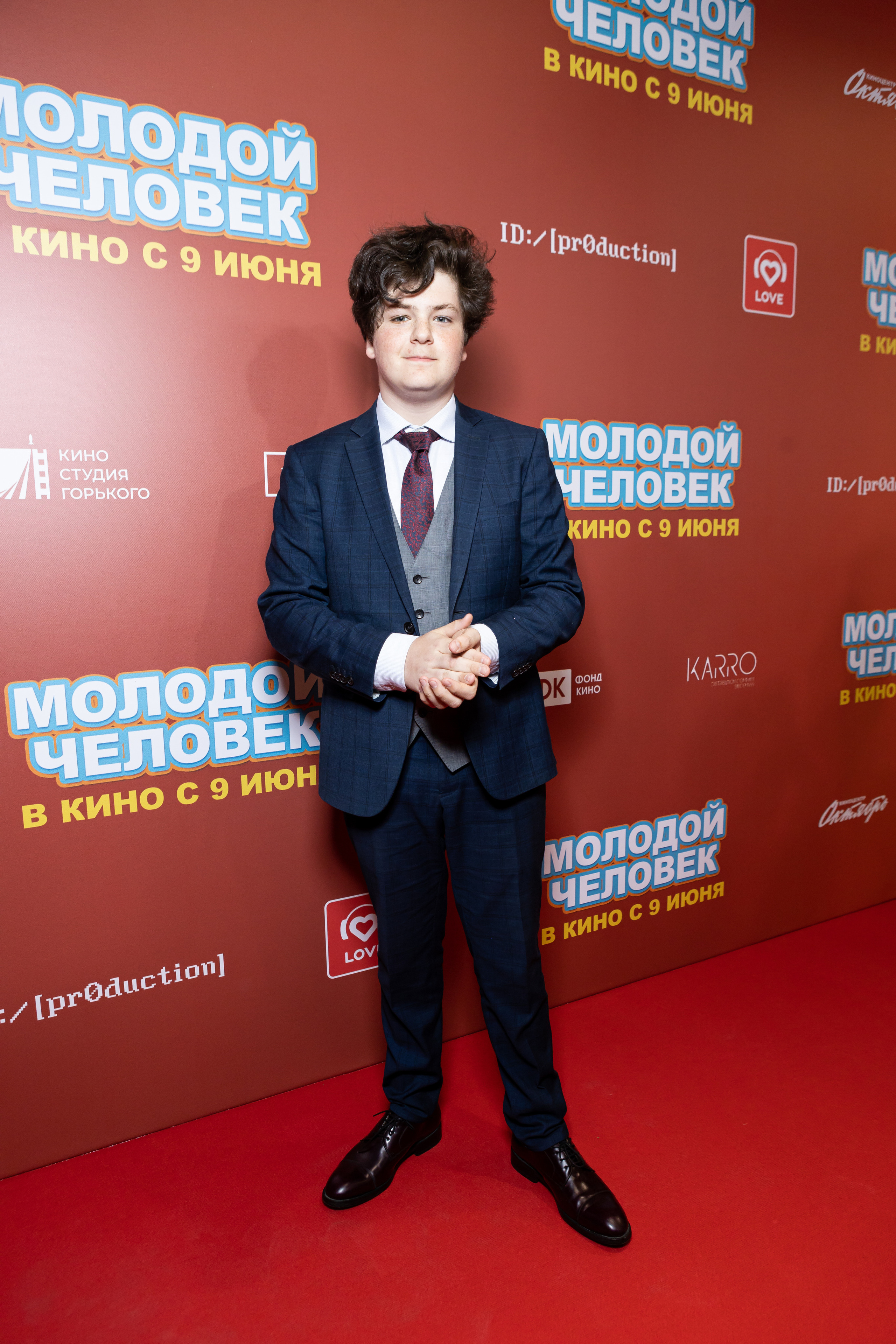 Молодой парень в кинотеатре КАРО ОКТЯБРЬ. Светский фотограф — Анисина Ирина