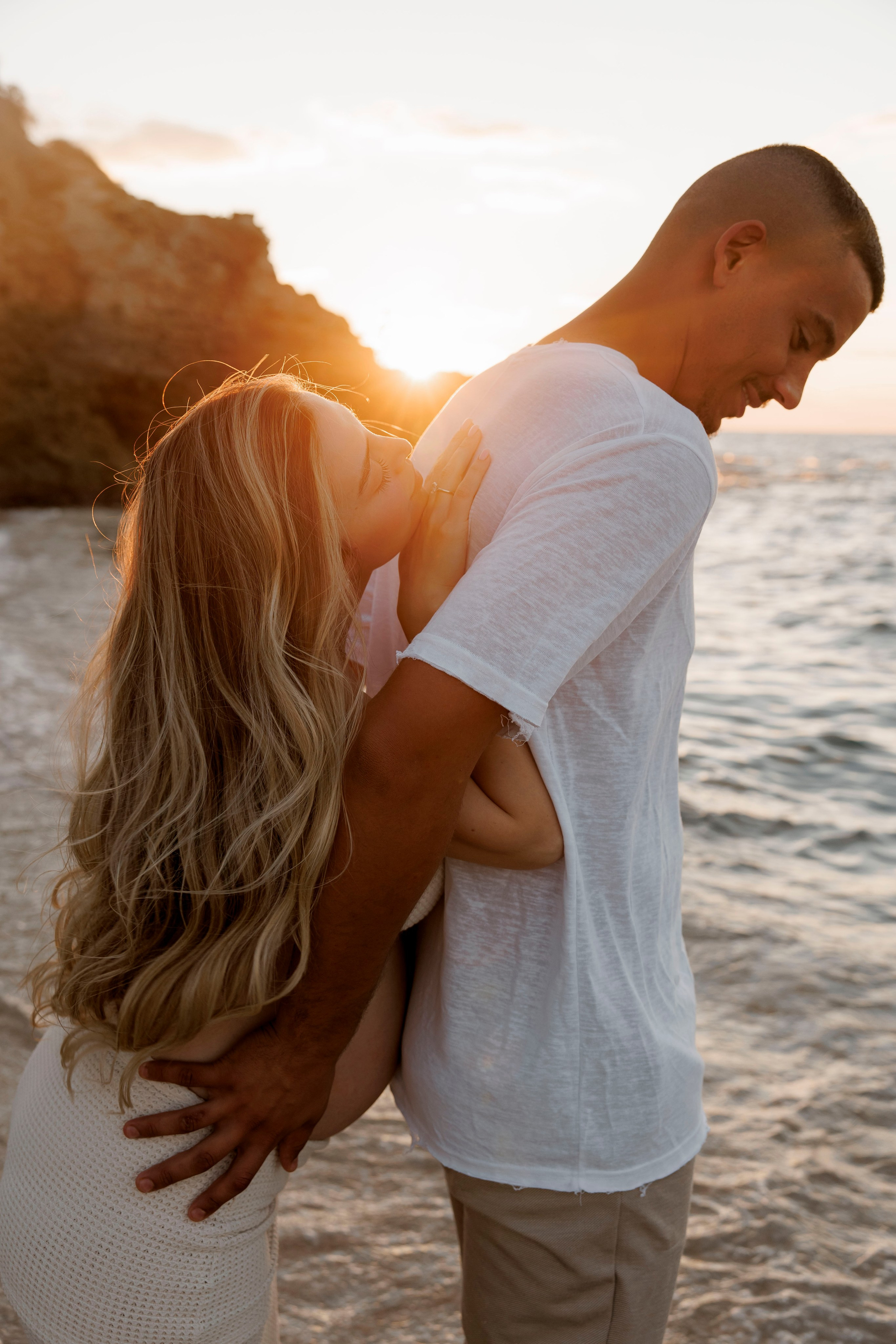 Pregnancy photoshoot near the sea. Wedding and family photographer