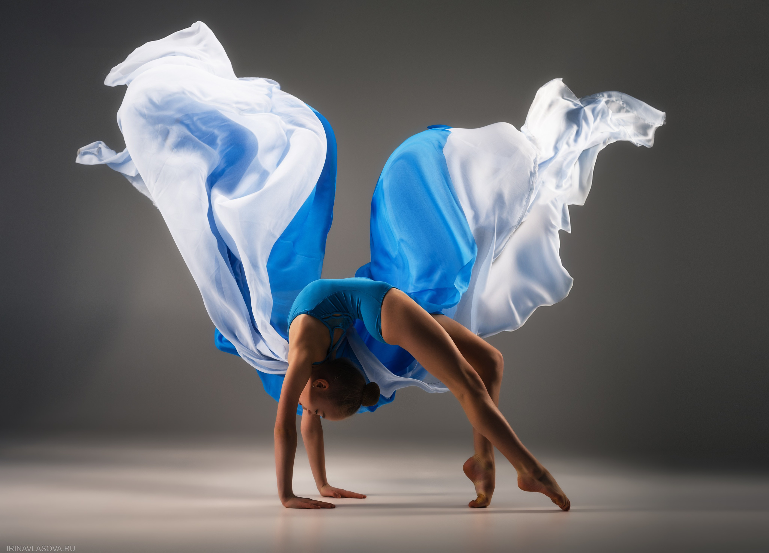 photo shoot of gymnasts with fabrics