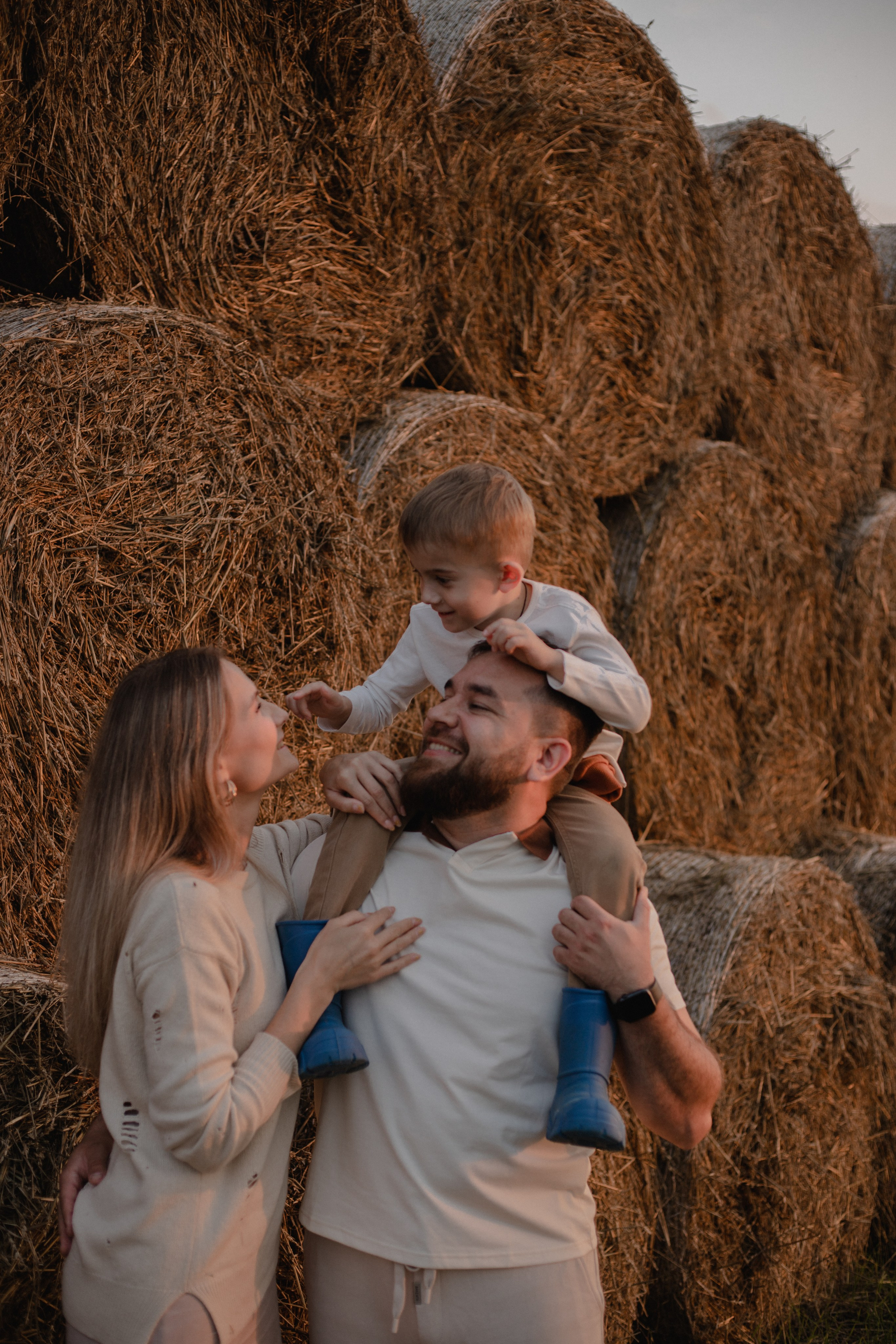 В стогах сена :)