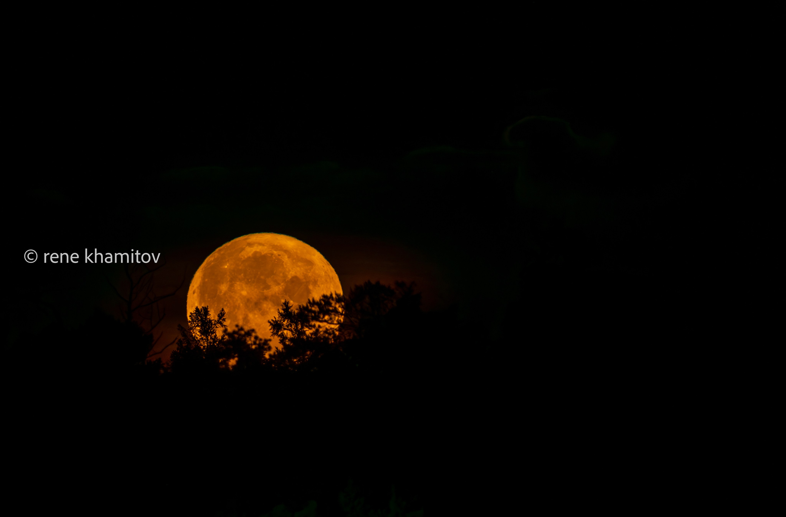 Rising moon over my village. Pictures of Rene Khamitov