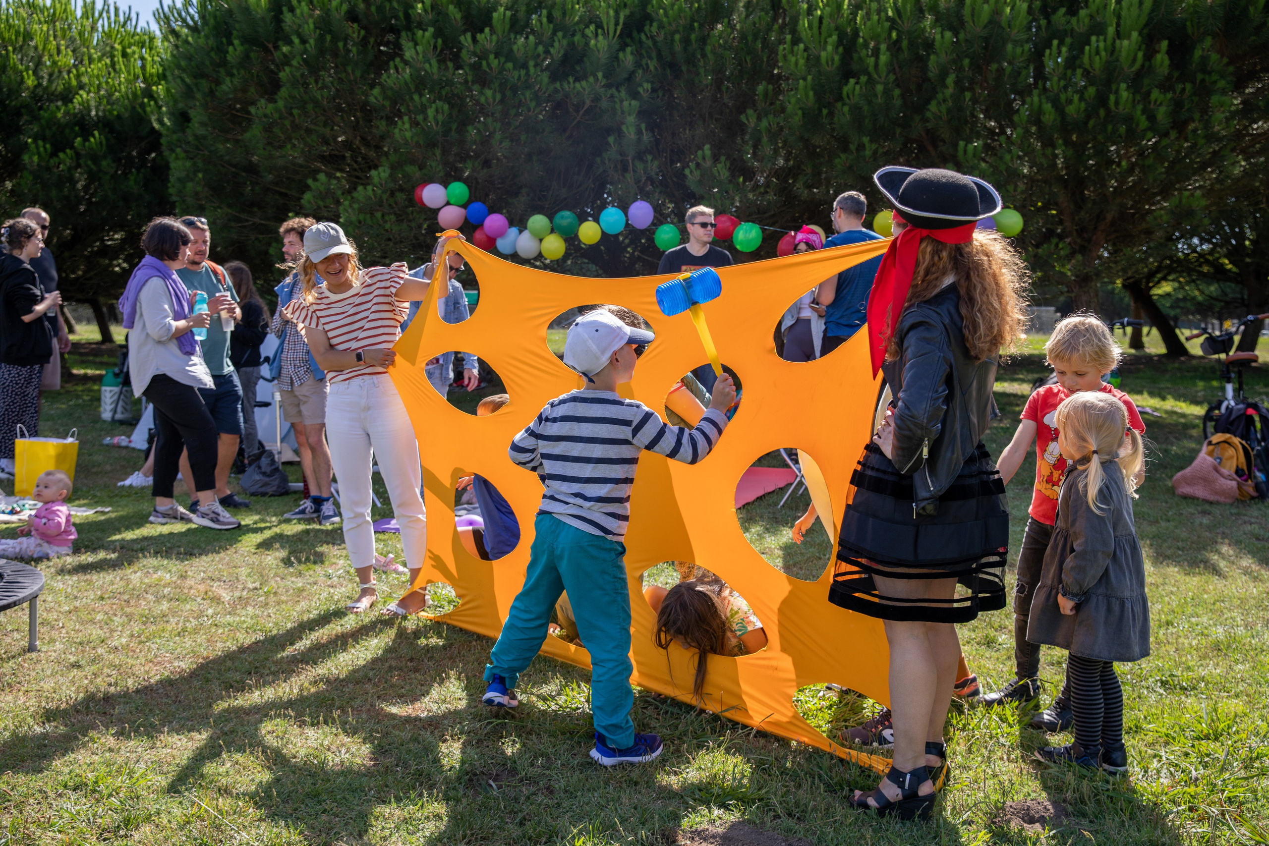Children's laughter and games in the park, with soap bubbles during a birthday photo session