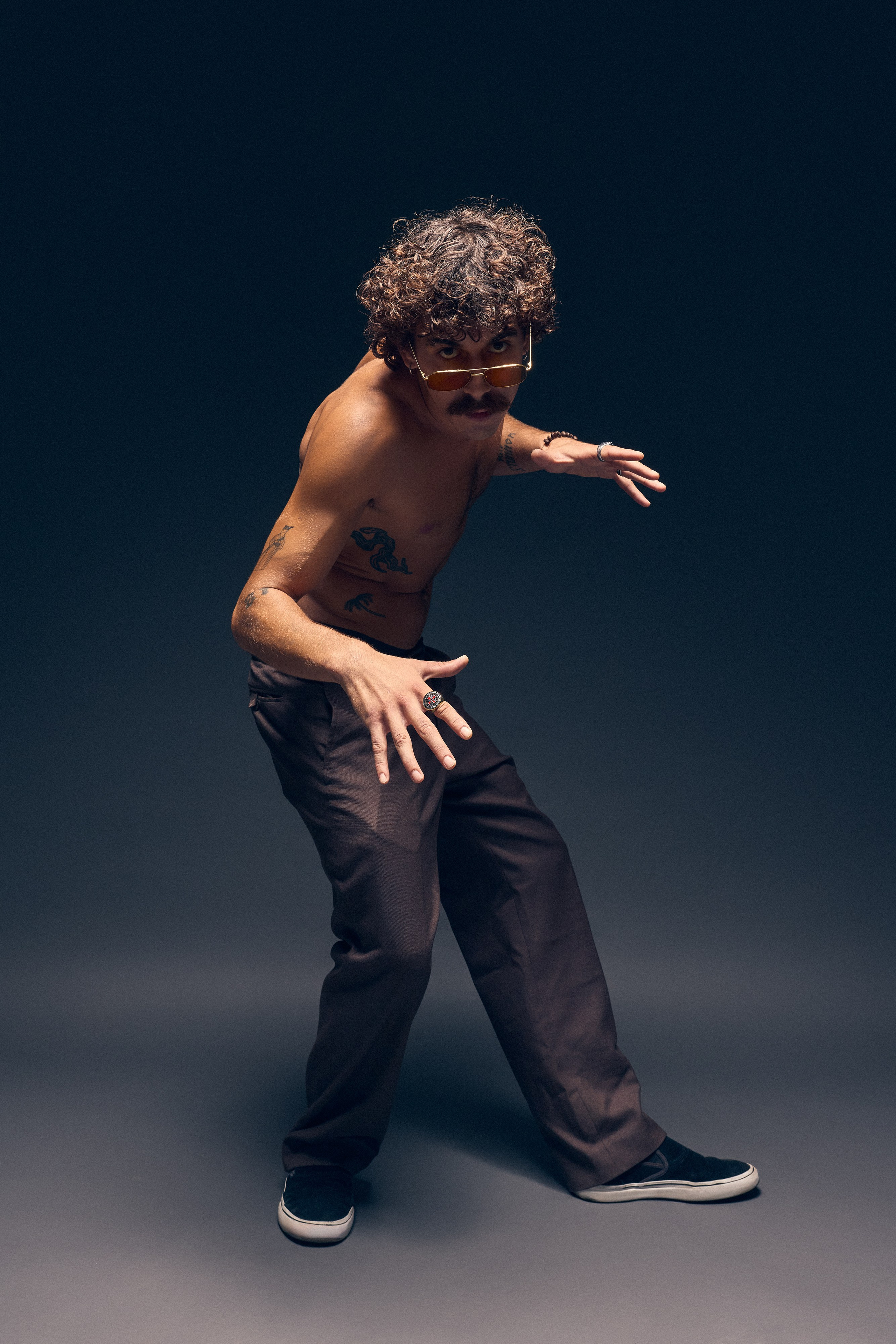 Artistic Escobar style photo with man in sunglasses and vintage vibe