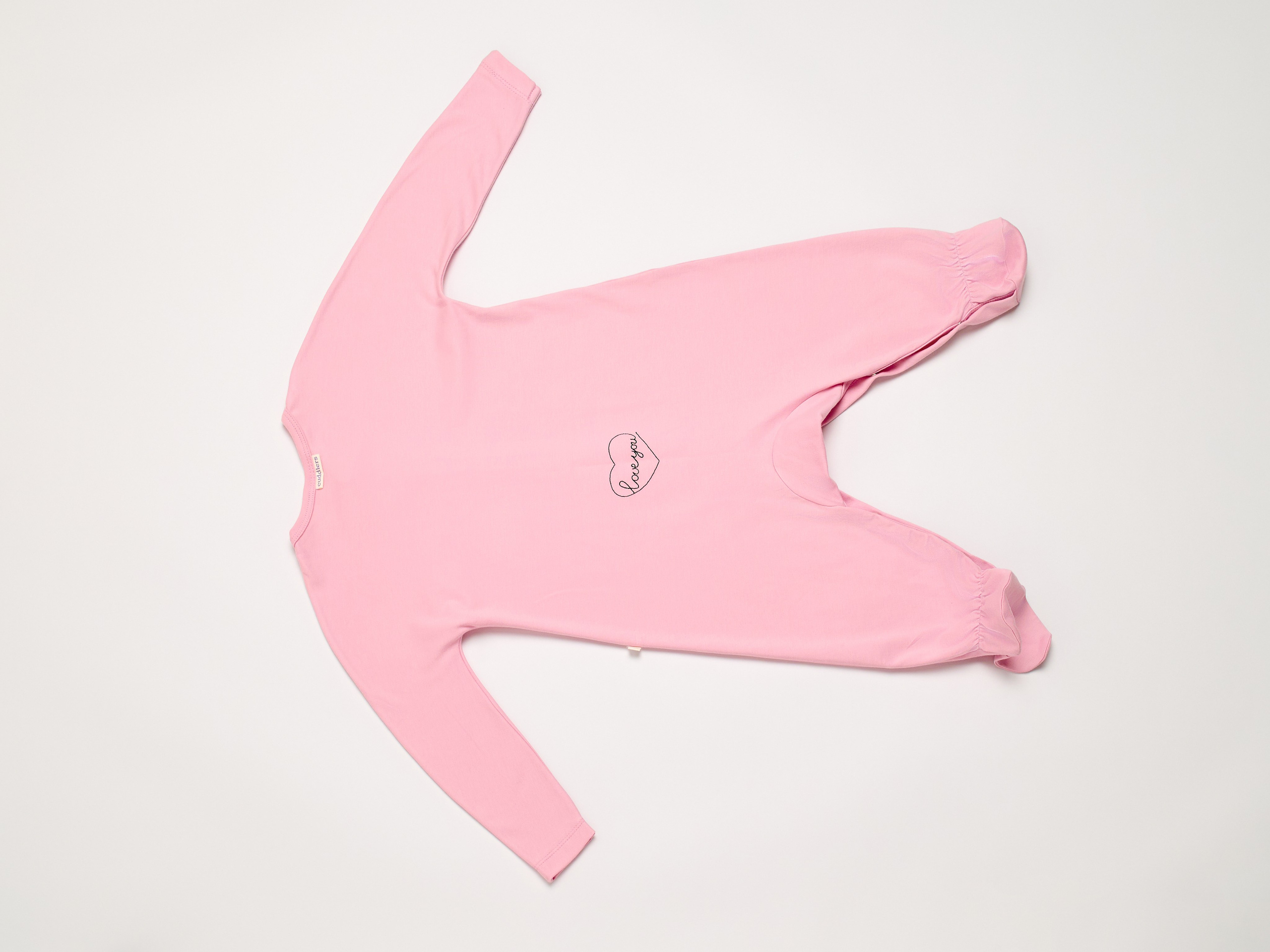 Детский комбинезон розового цвета