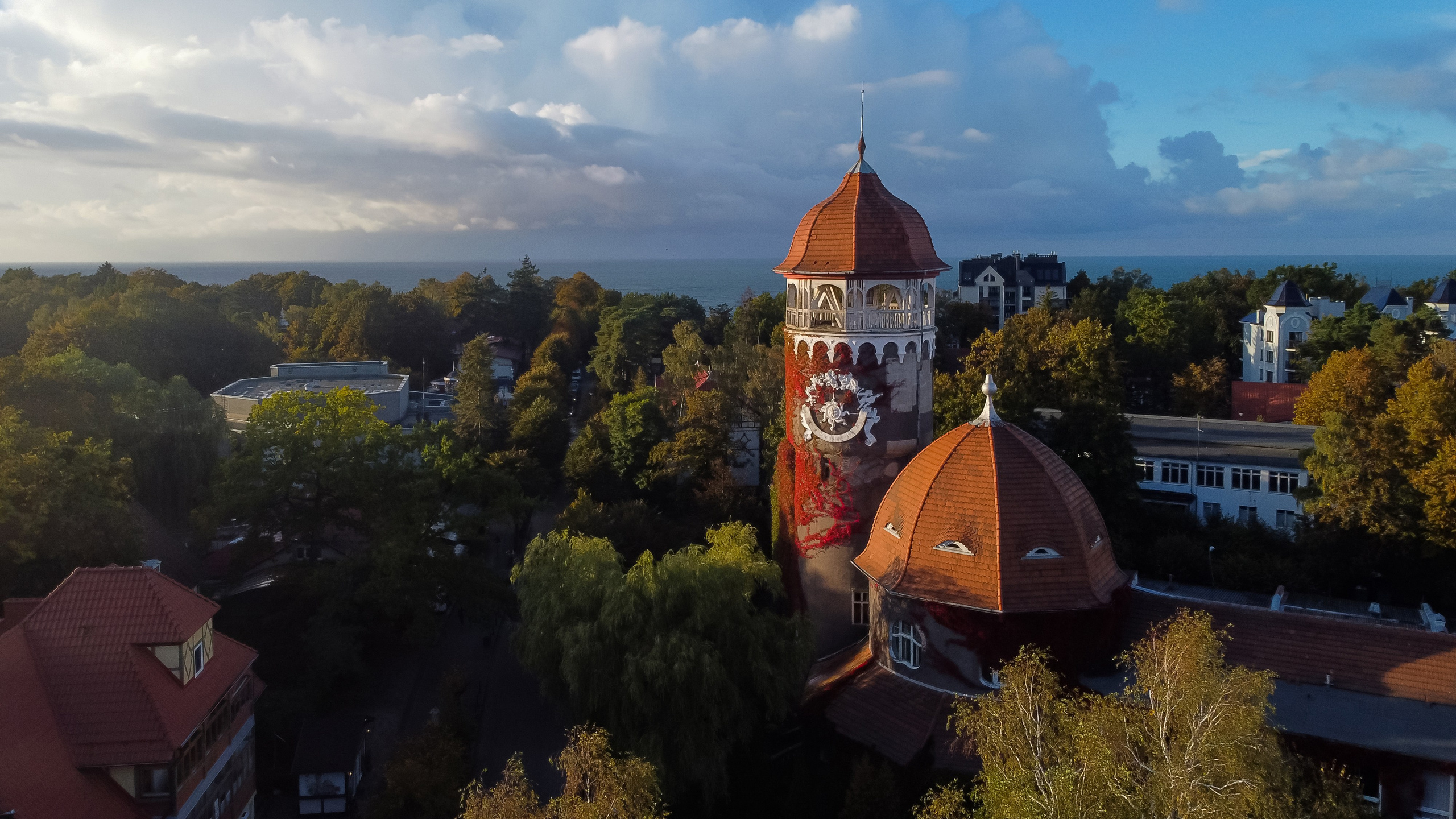 https://lori.ru/40975582 Svetlogorsk, Russia - October 2, 2022: The Water Tower is one of the most famous symbol of the city. Kaliningrad region. Aerial view from drone