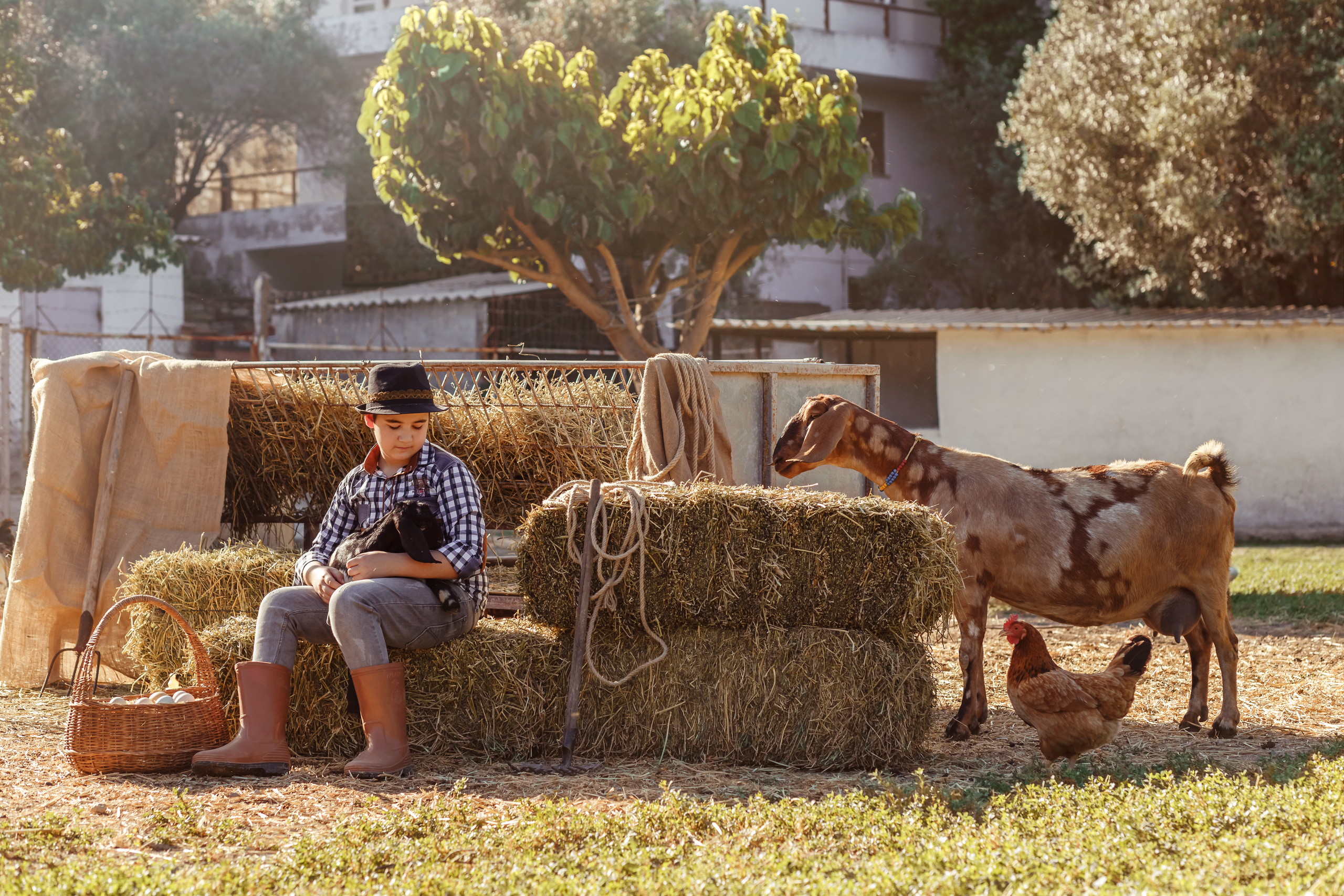 Farm photo shoot with a baby goat. Professional family and children’s photographer in Izmir Irina Eron