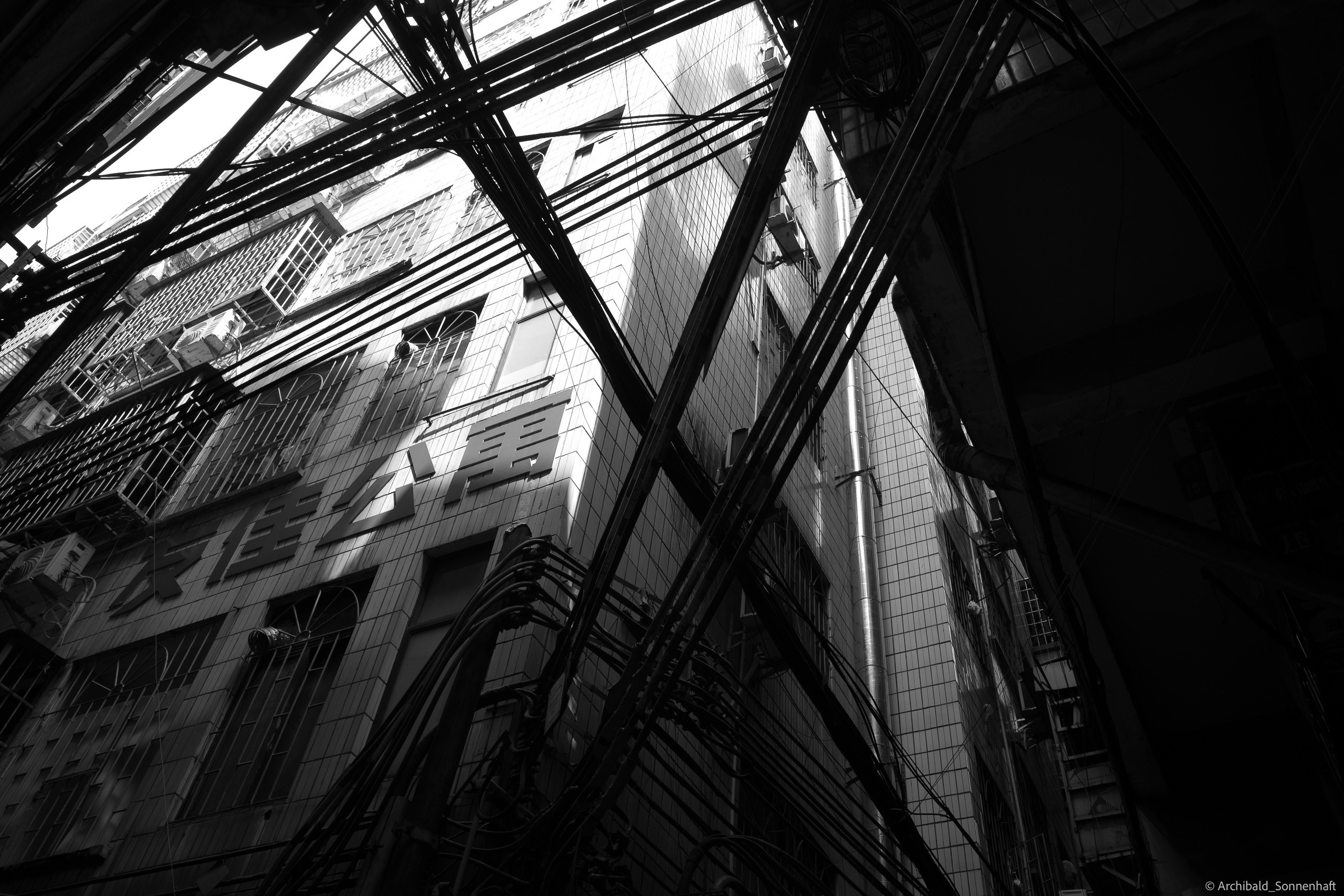 Shipai Urban Village. Photographer in Guangzhou, China. Archibald Sonnenhaft