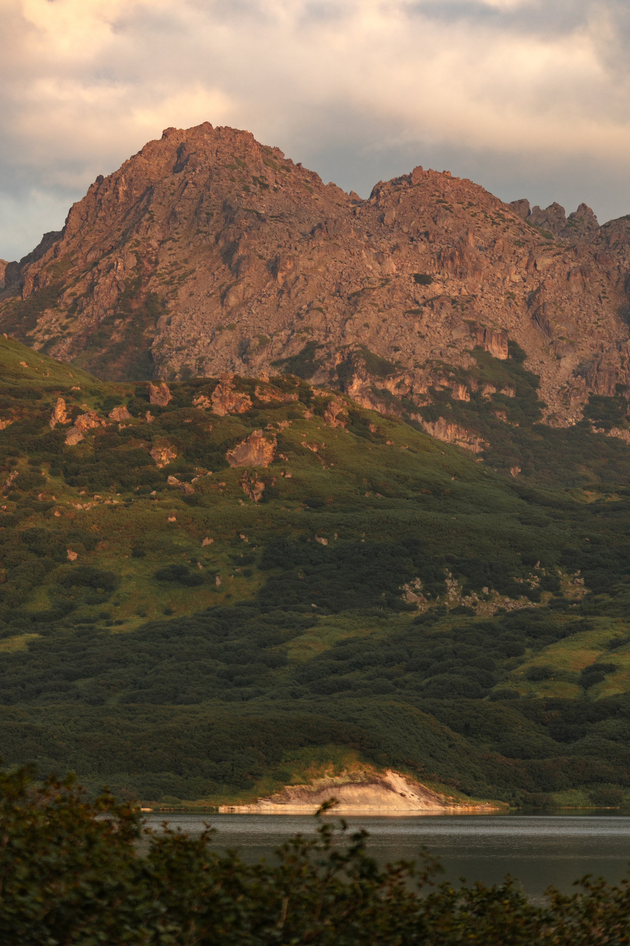 Vitaminnoye Lake and the Wild Greben Volcano. Professional photographer Alexey Nikitin in Moscow