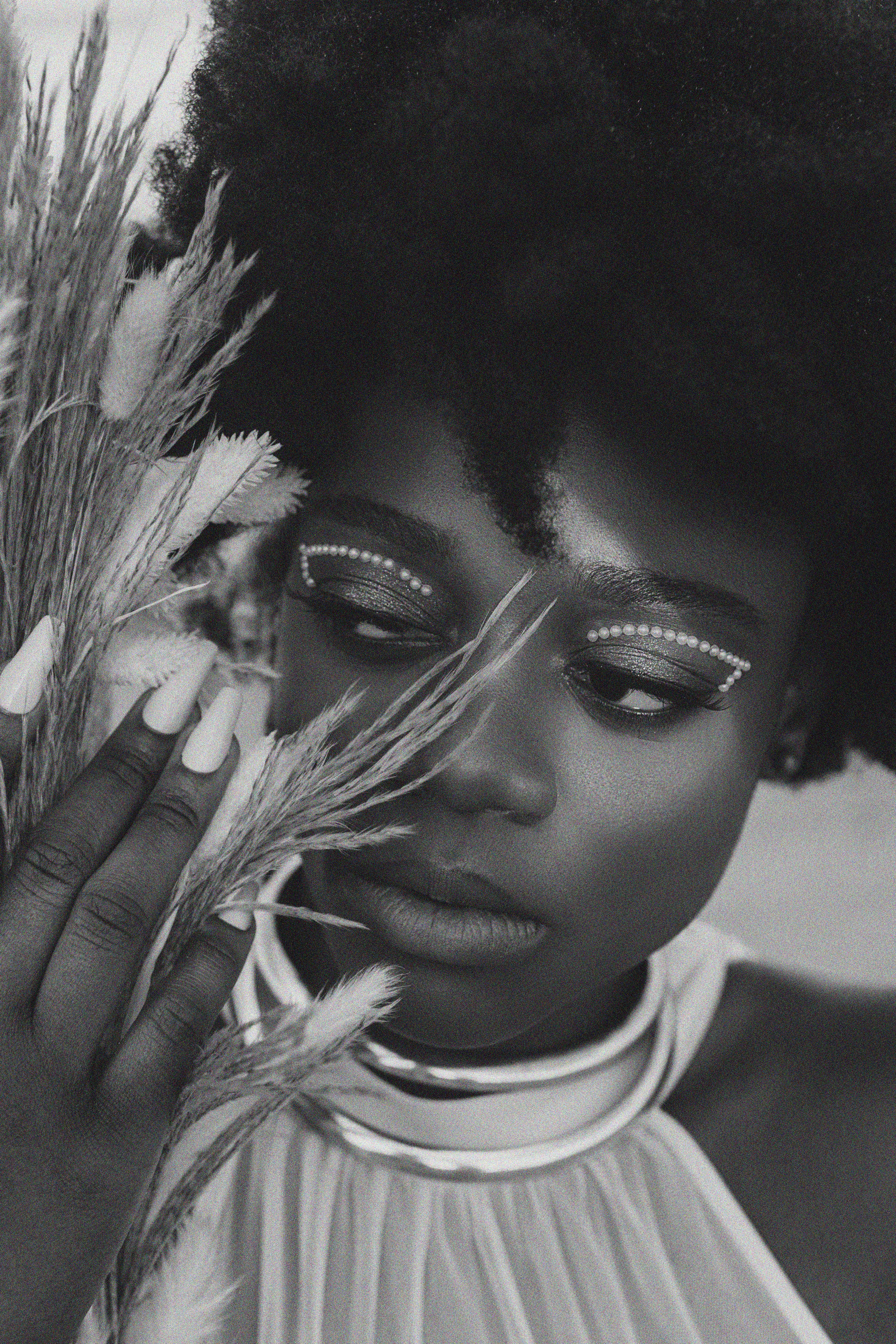 Woman sitting on the ocean in a white dress Professional photographer in Delray Beach, Boynton Beach, Boca Raton, Palm Beach, South Florida. women’s portraits, events, content, family and children’s shoots