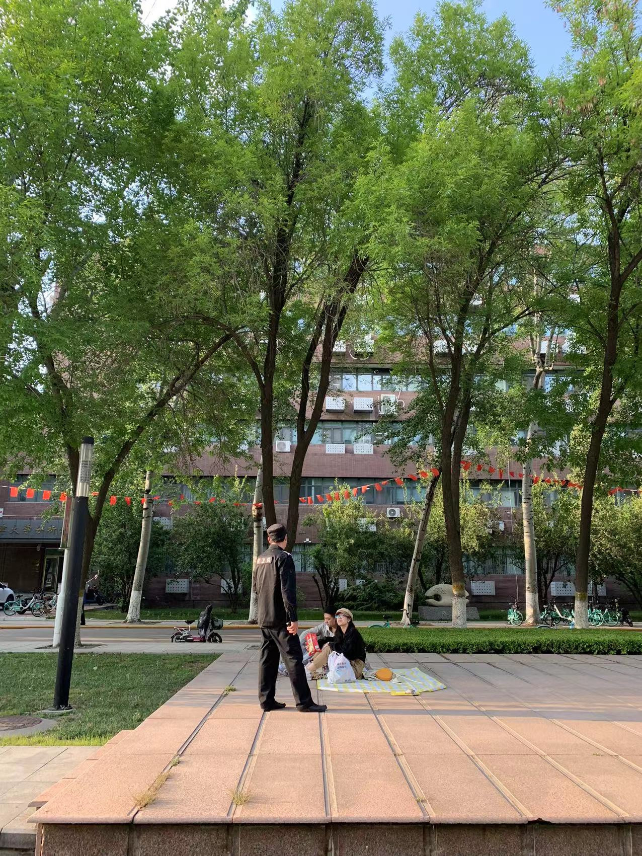 Walking in TJU on the first of May. Photographer in Guangzhou, China. Archibald Sonnenhaft