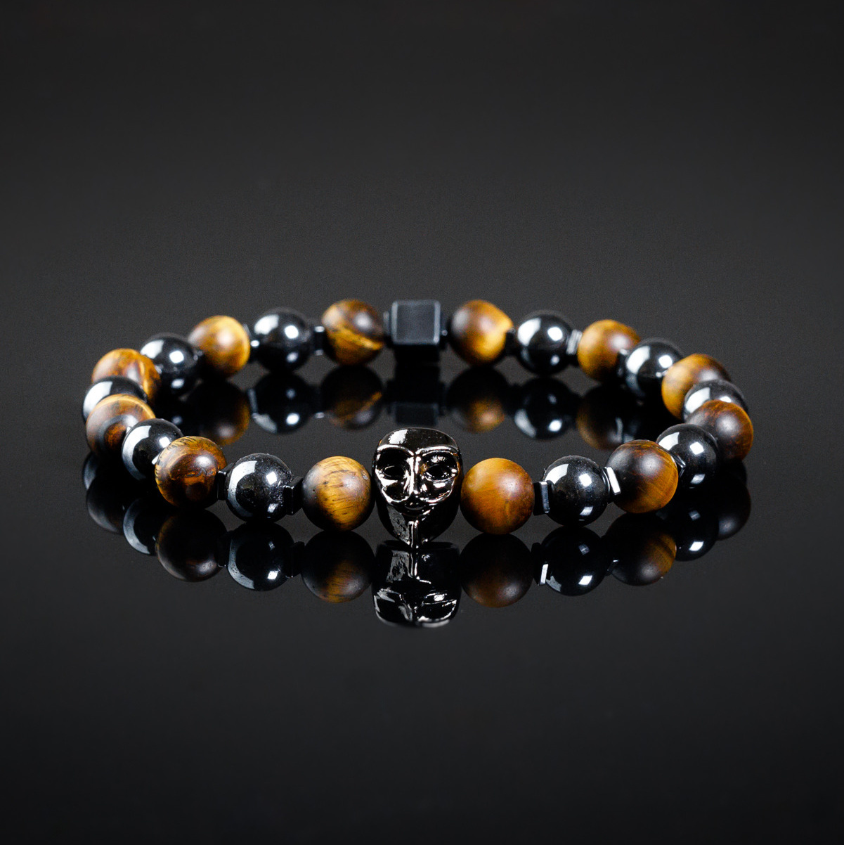 — из камней