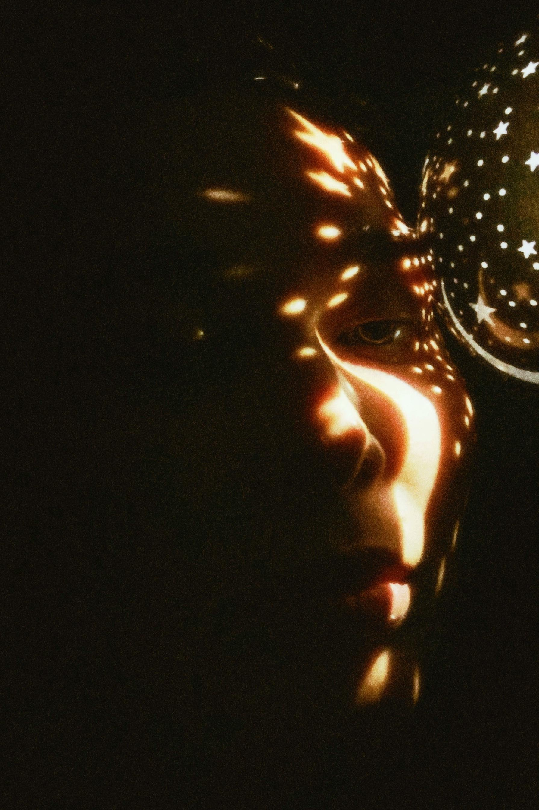 Abstract Light Patterns on Face for Social Marketing Strategy