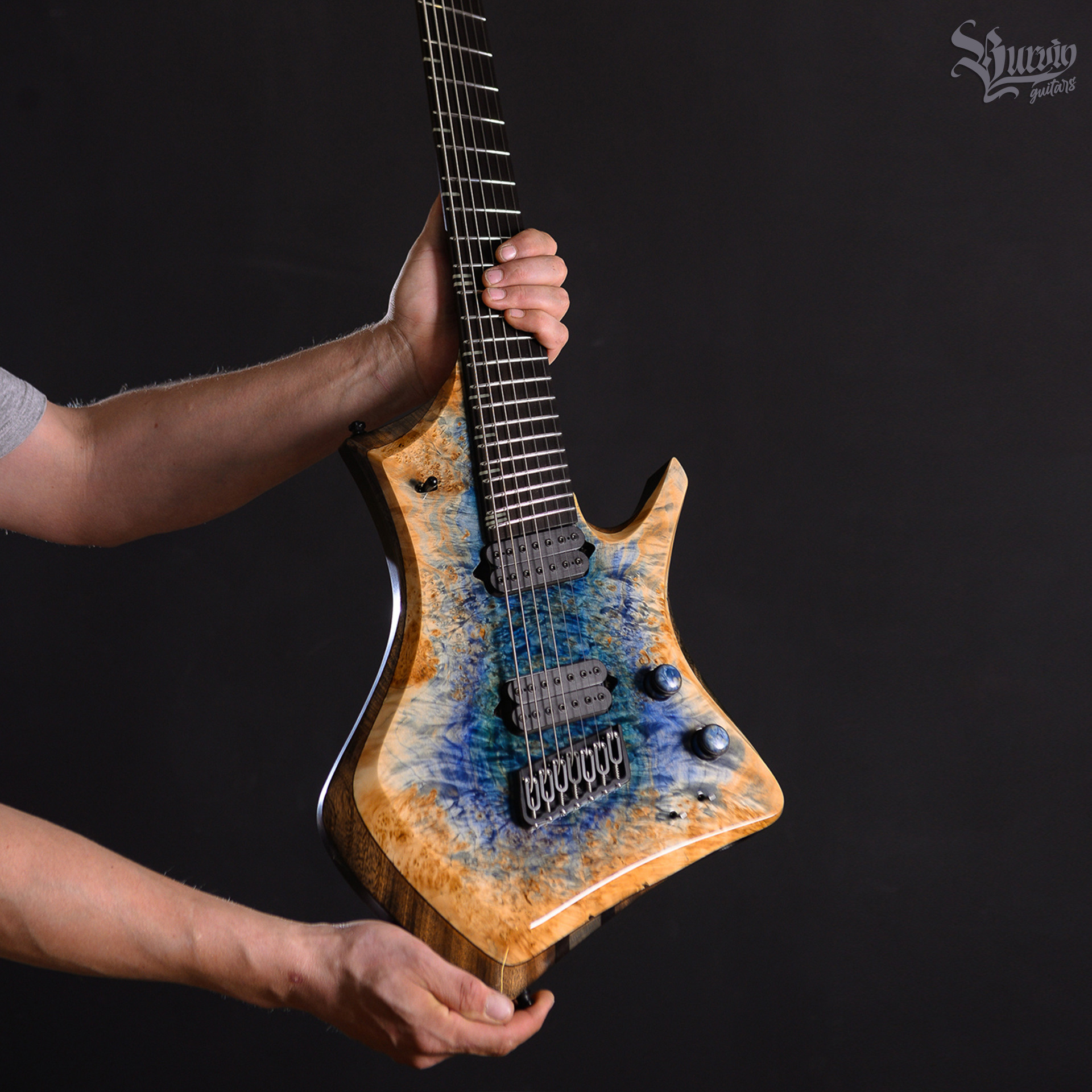 Order. Master of making guitars and basses to order