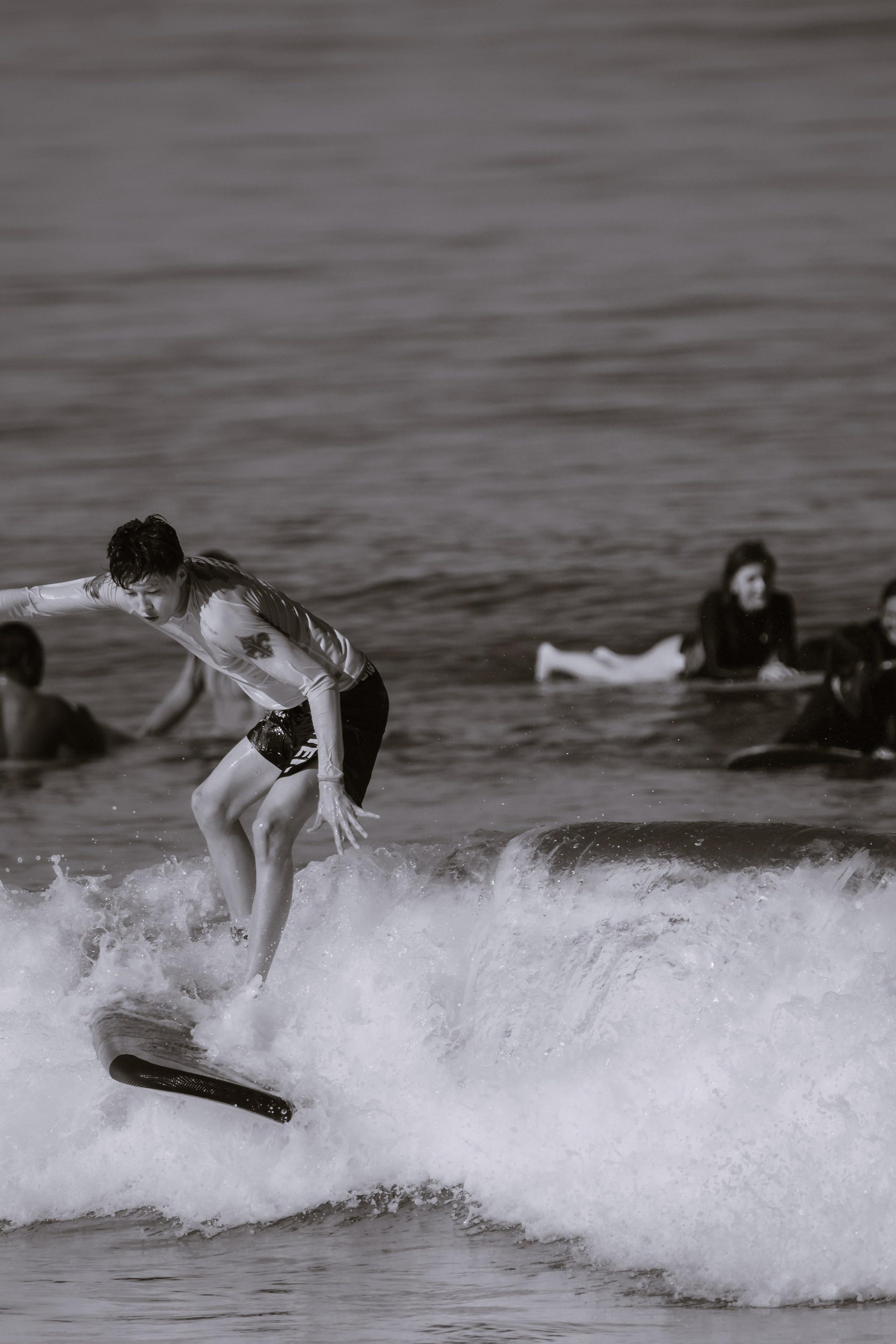 Al Leone athletes having fun surfing in the Pacific Ocean. Сергей Зворыгин