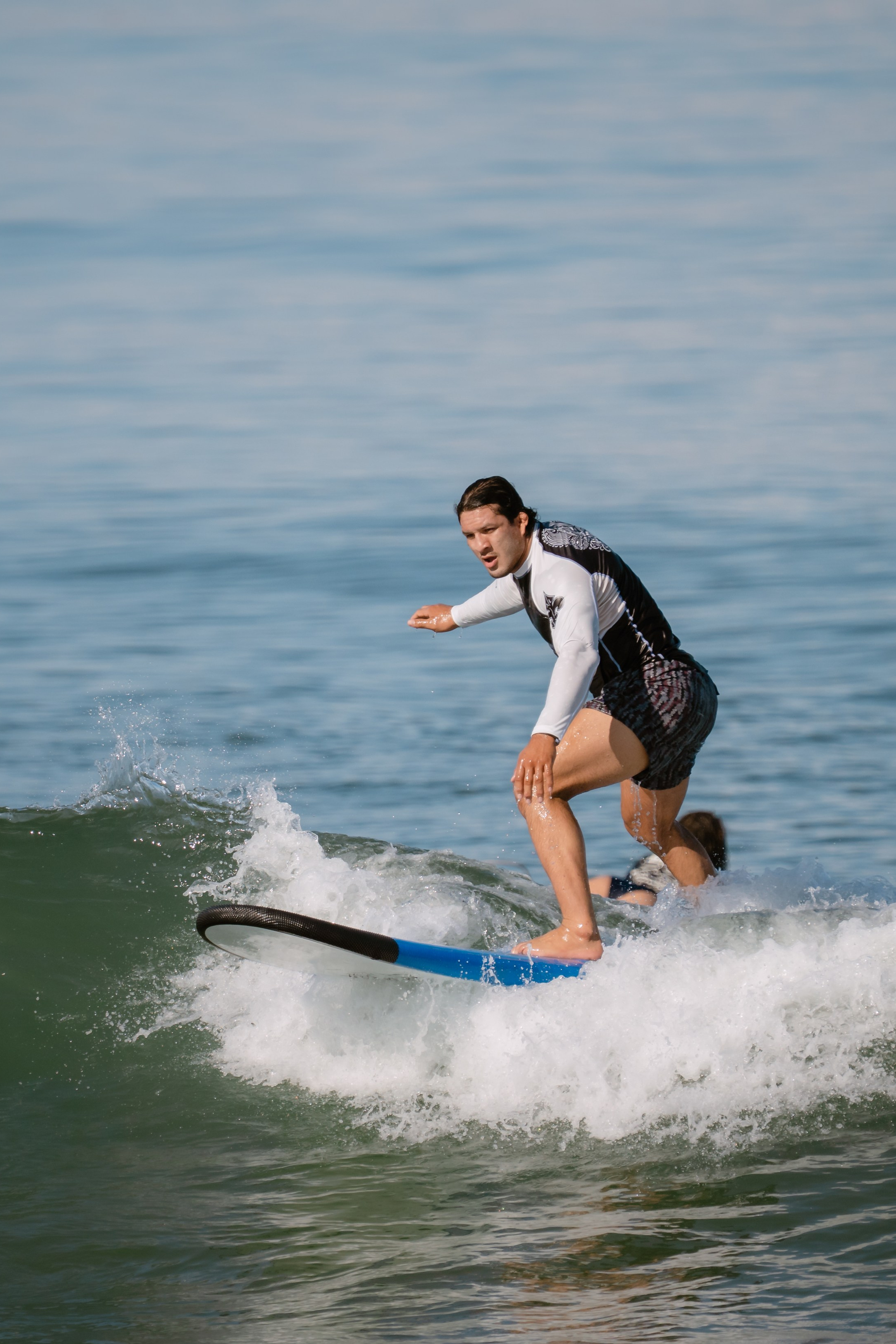 Al Leone athletes having fun surfing in the Pacific Ocean. Сергей Зворыгин