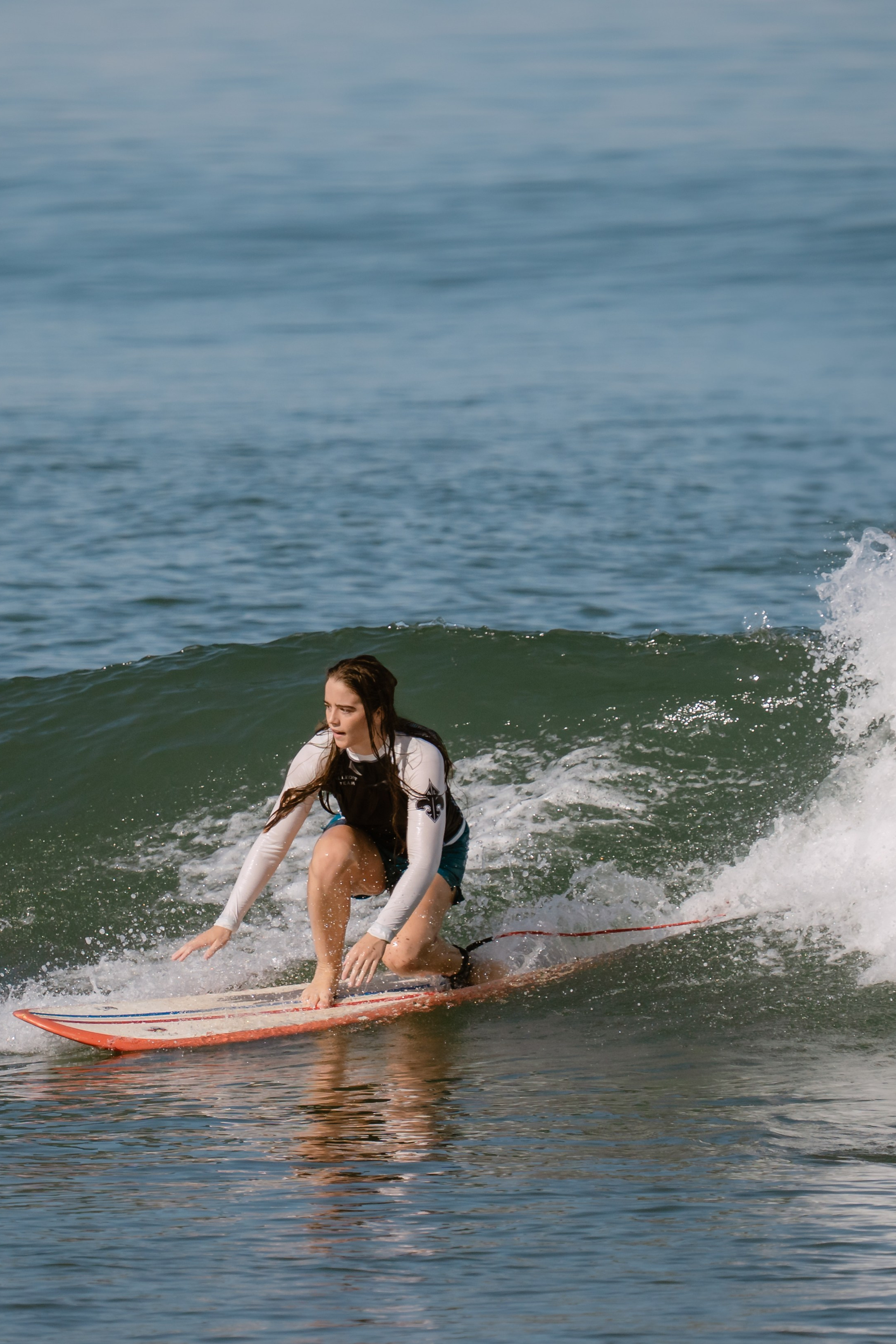 Al Leone athletes having fun surfing in the Pacific Ocean. Сергей Зворыгин