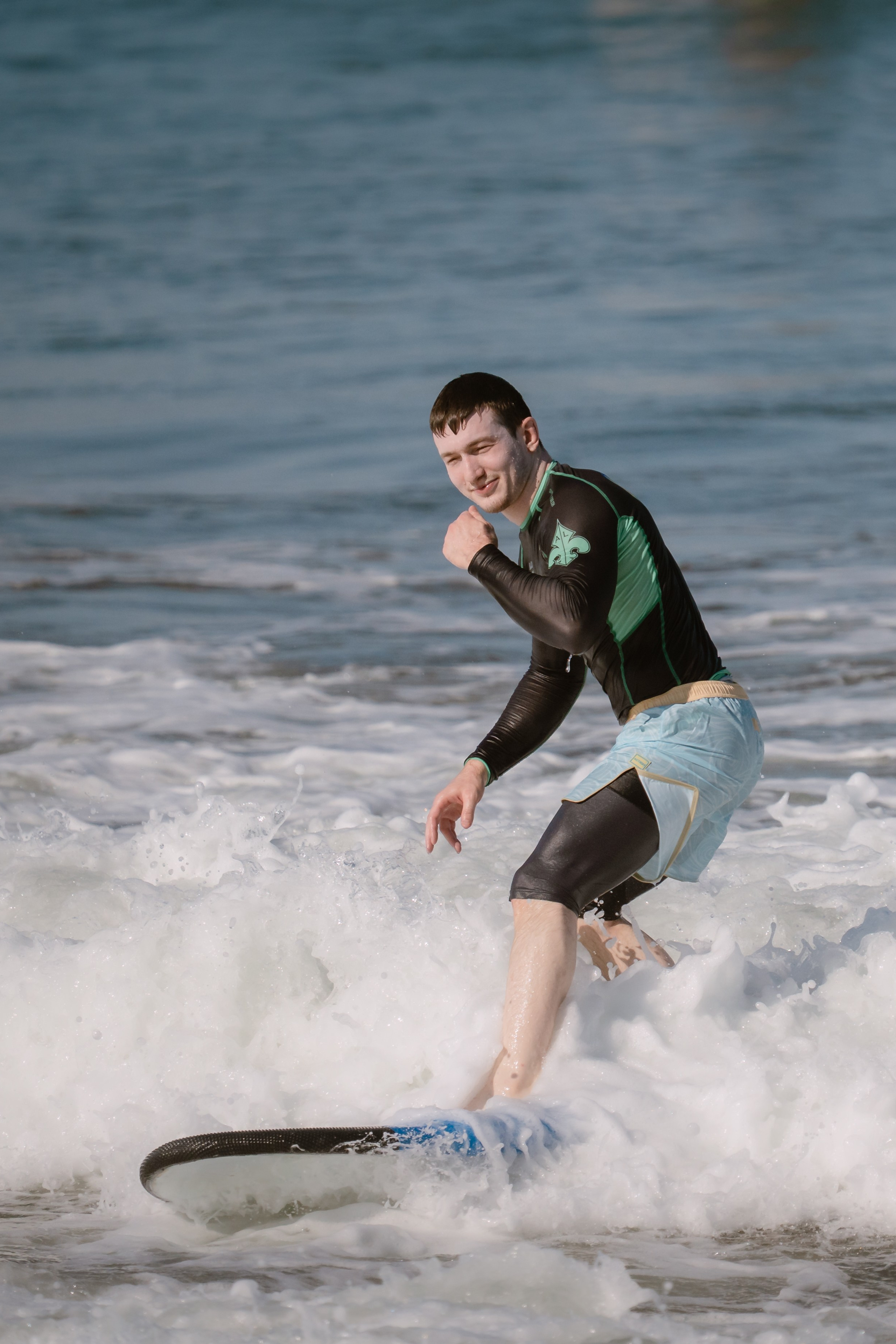 Al Leone athletes having fun surfing in the Pacific Ocean. Сергей Зворыгин