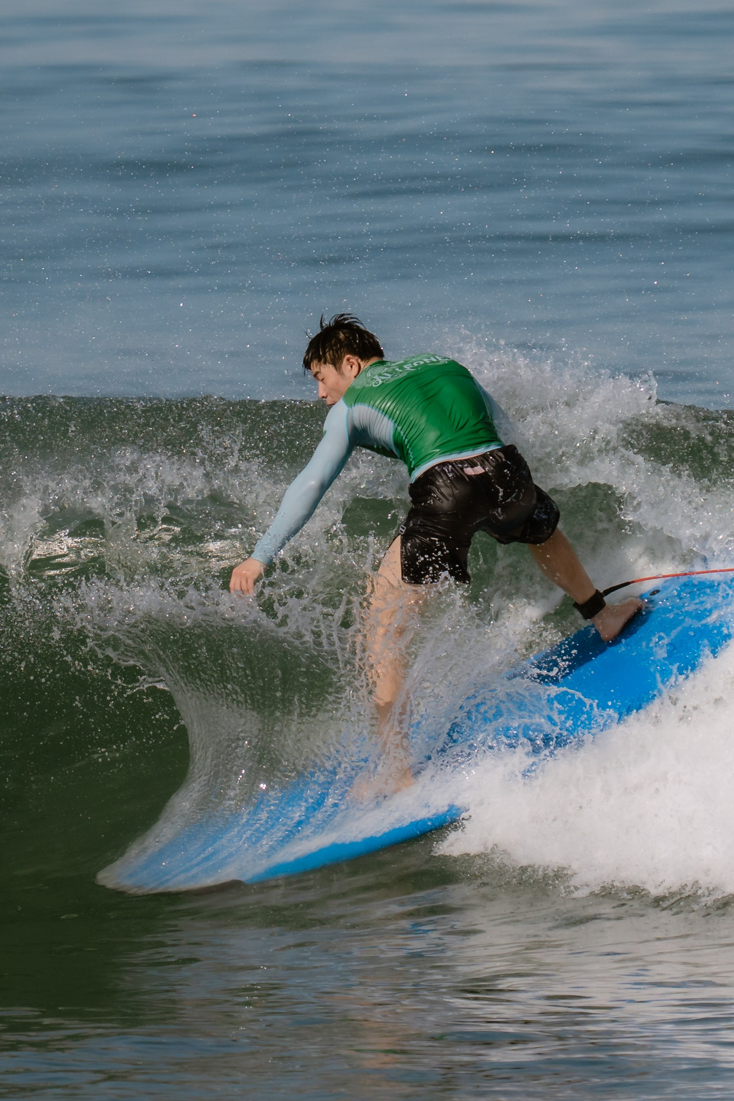 Al Leone athletes having fun surfing in the Pacific Ocean. Сергей Зворыгин