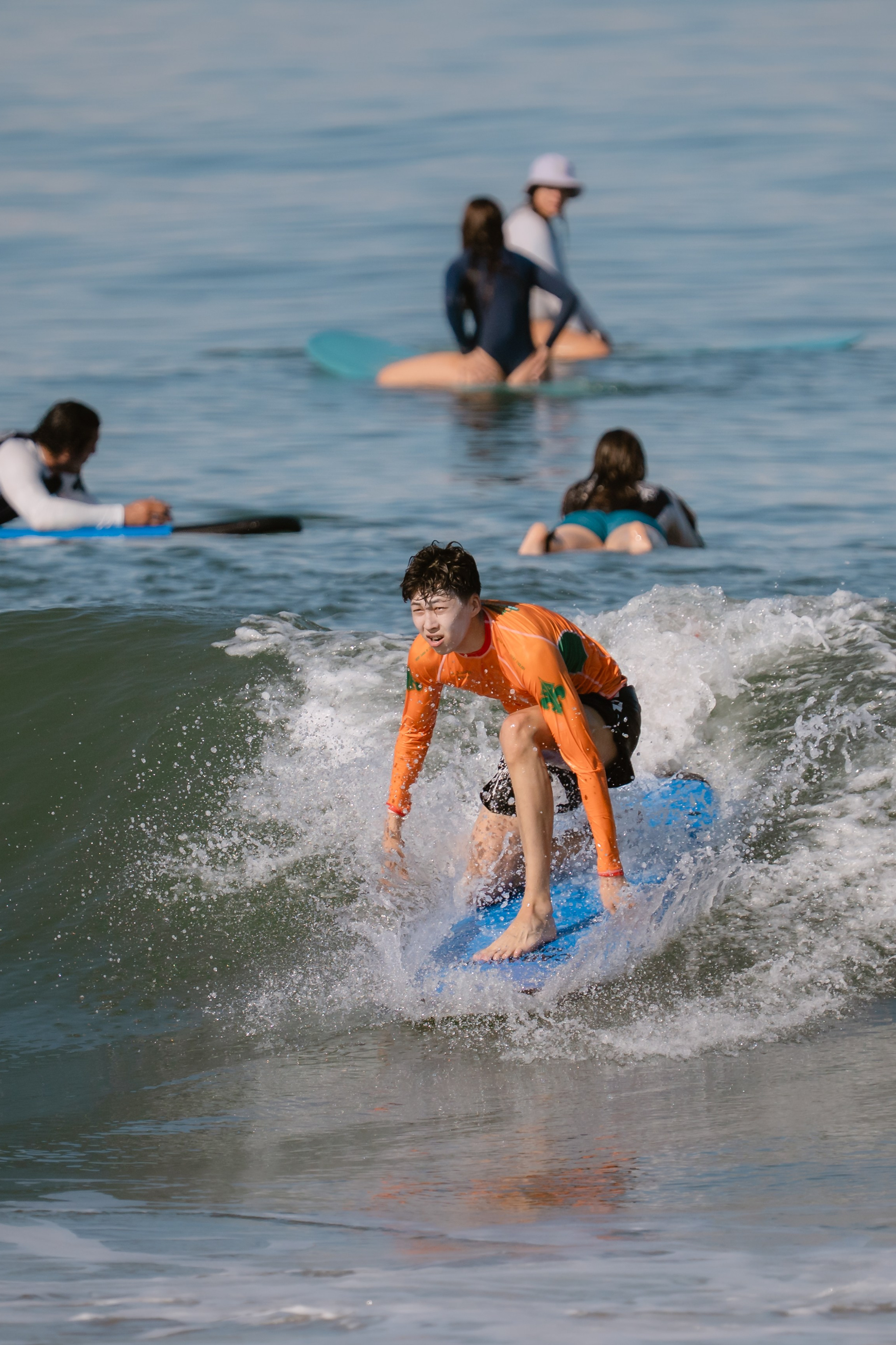 Al Leone athletes having fun surfing in the Pacific Ocean. Сергей Зворыгин