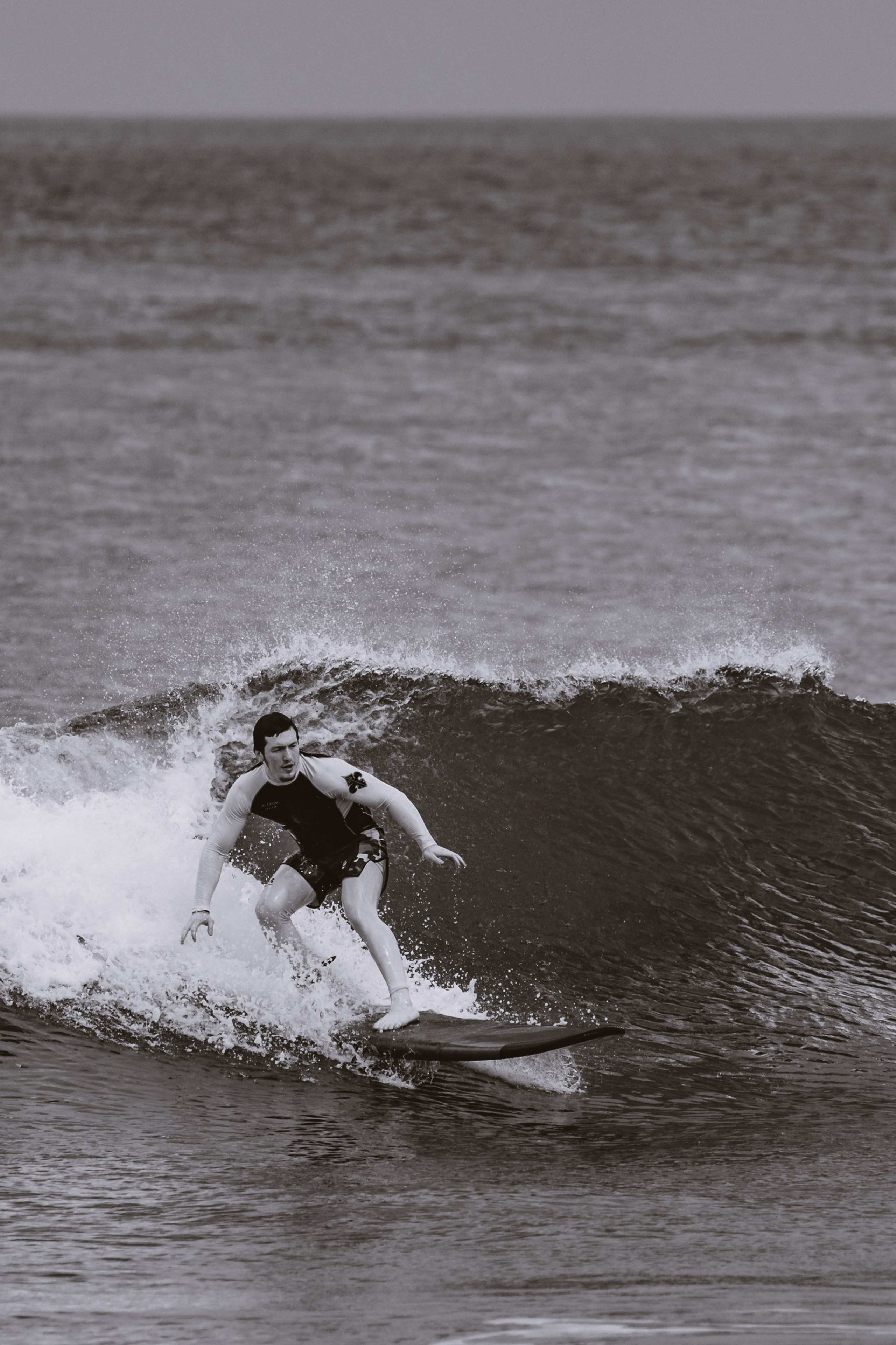 Mixed martial artists having fun surfing at the ocean in between training sessions. Сергей Зворыгин