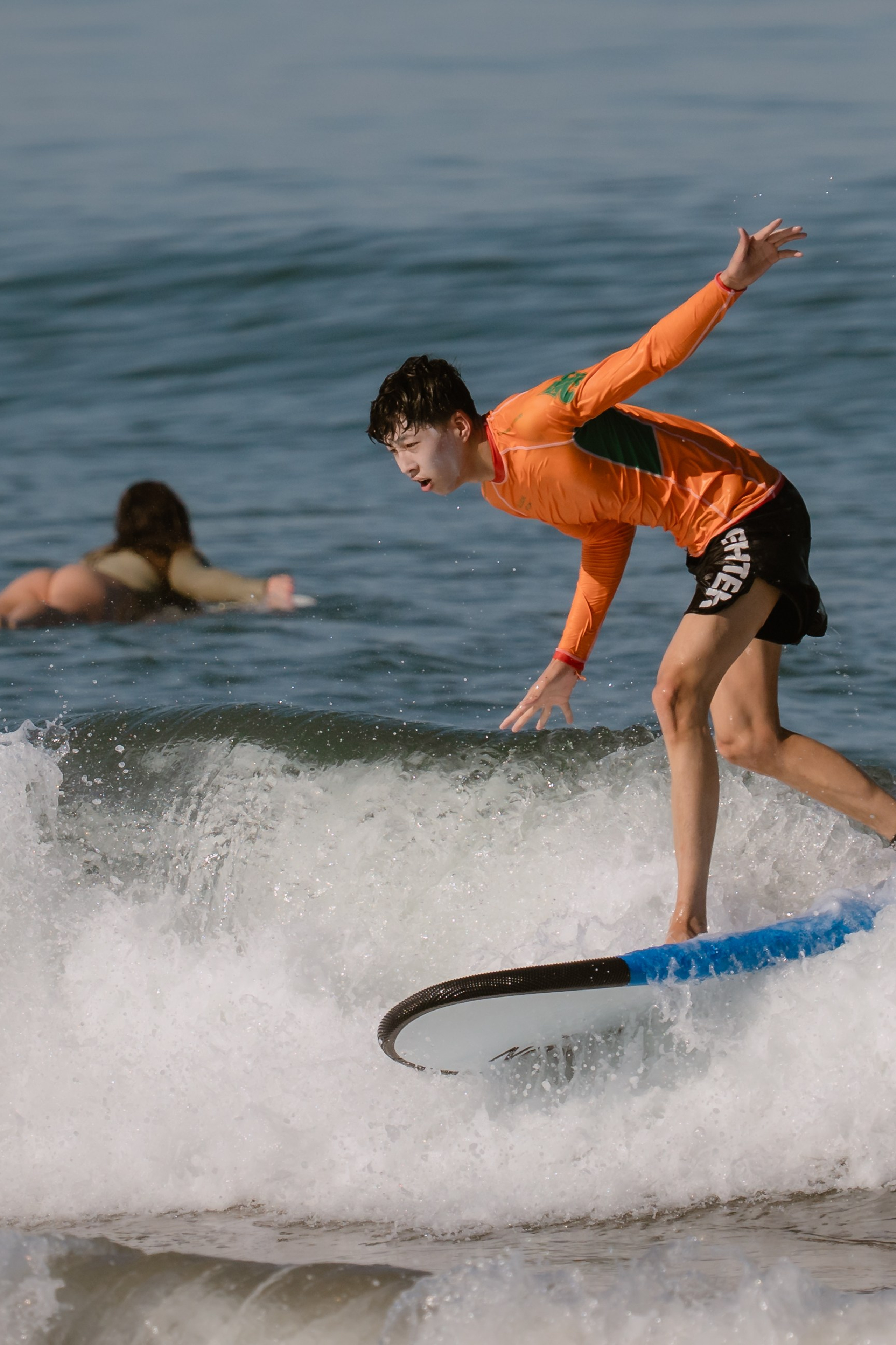 Al Leone athletes having fun surfing in the Pacific Ocean. Сергей Зворыгин