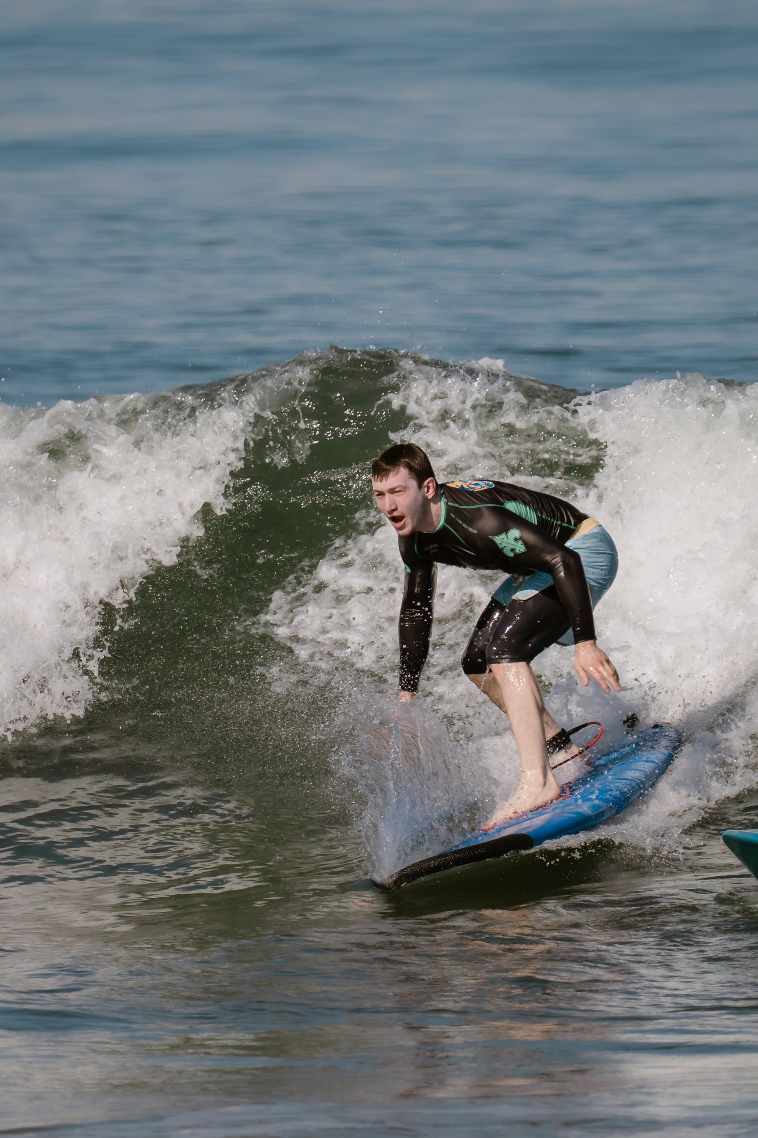 Al Leone athletes having fun surfing in the Pacific Ocean. Сергей Зворыгин