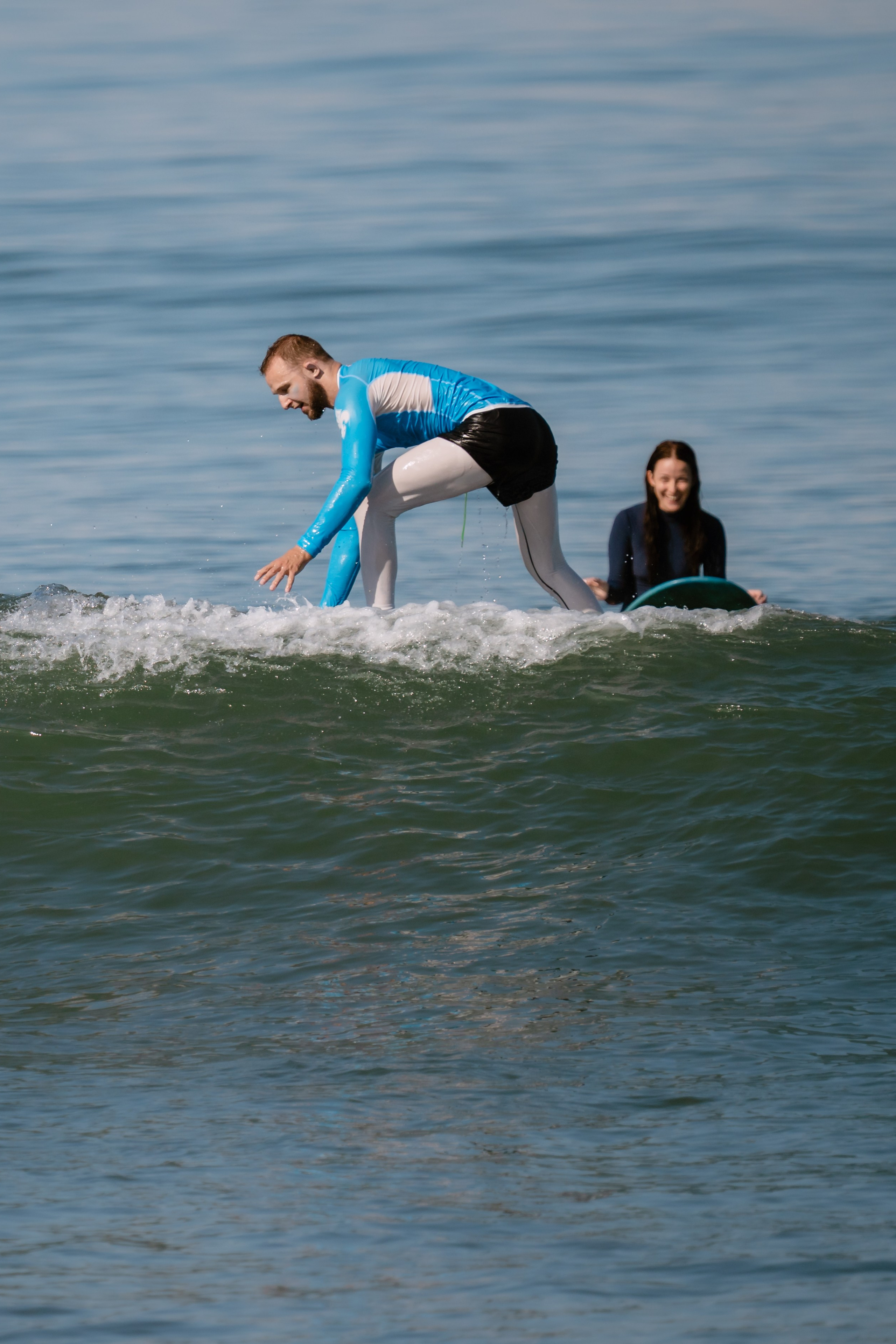 Al Leone athletes having fun surfing in the Pacific Ocean. Сергей Зворыгин