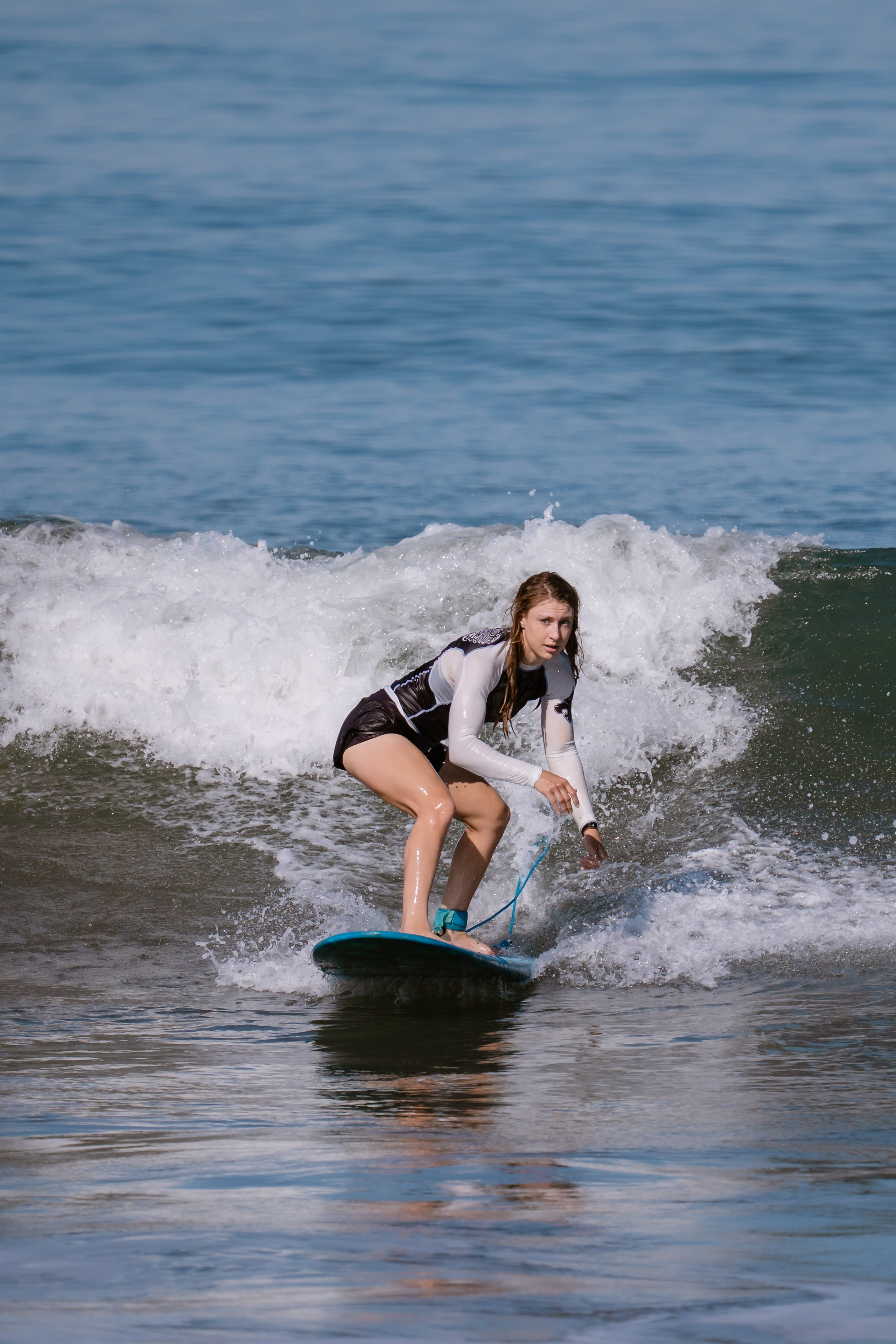 Al Leone athletes having fun surfing in the Pacific Ocean. Сергей Зворыгин