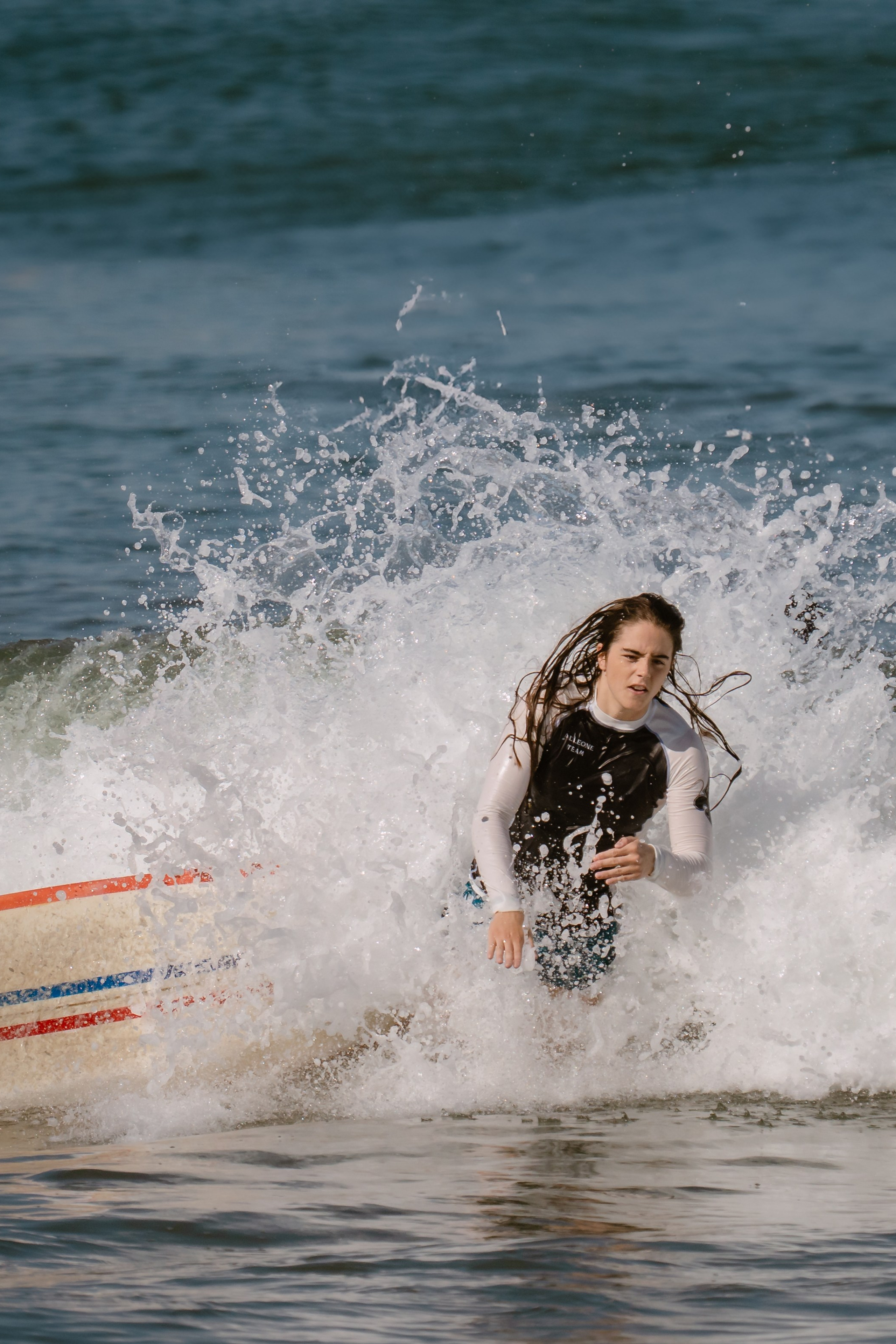 Al Leone athletes having fun surfing in the Pacific Ocean. Сергей Зворыгин
