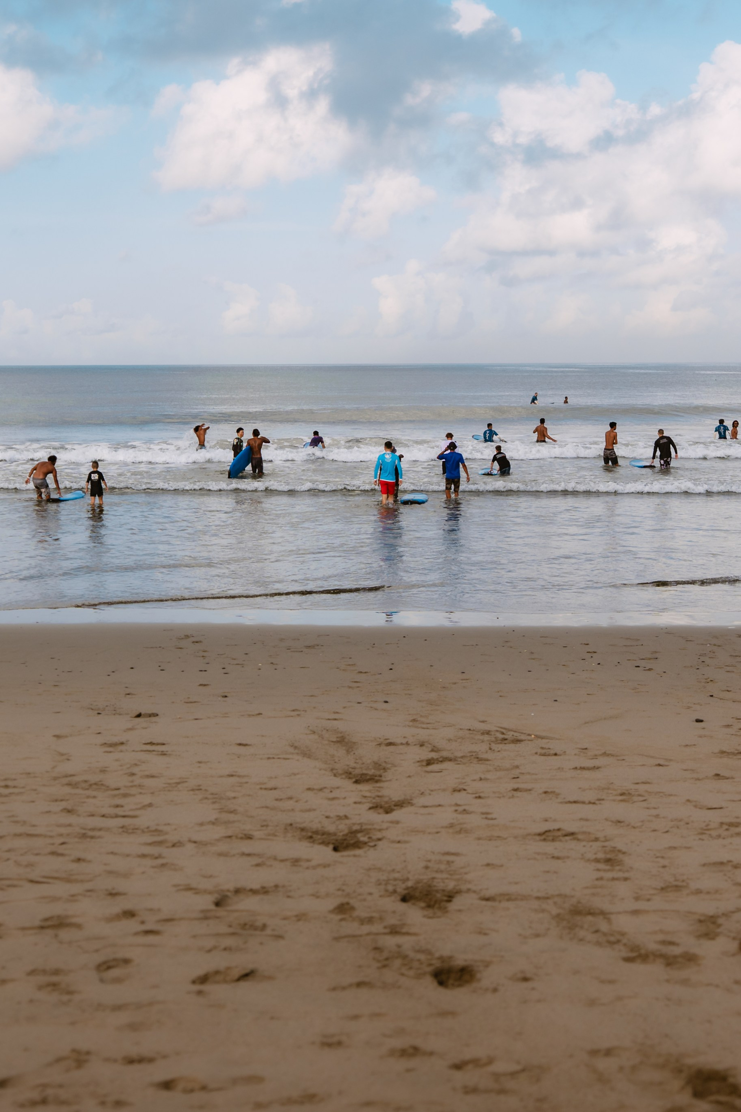 Mixed martial artists having fun surfing at the ocean in between training sessions. Сергей Зворыгин