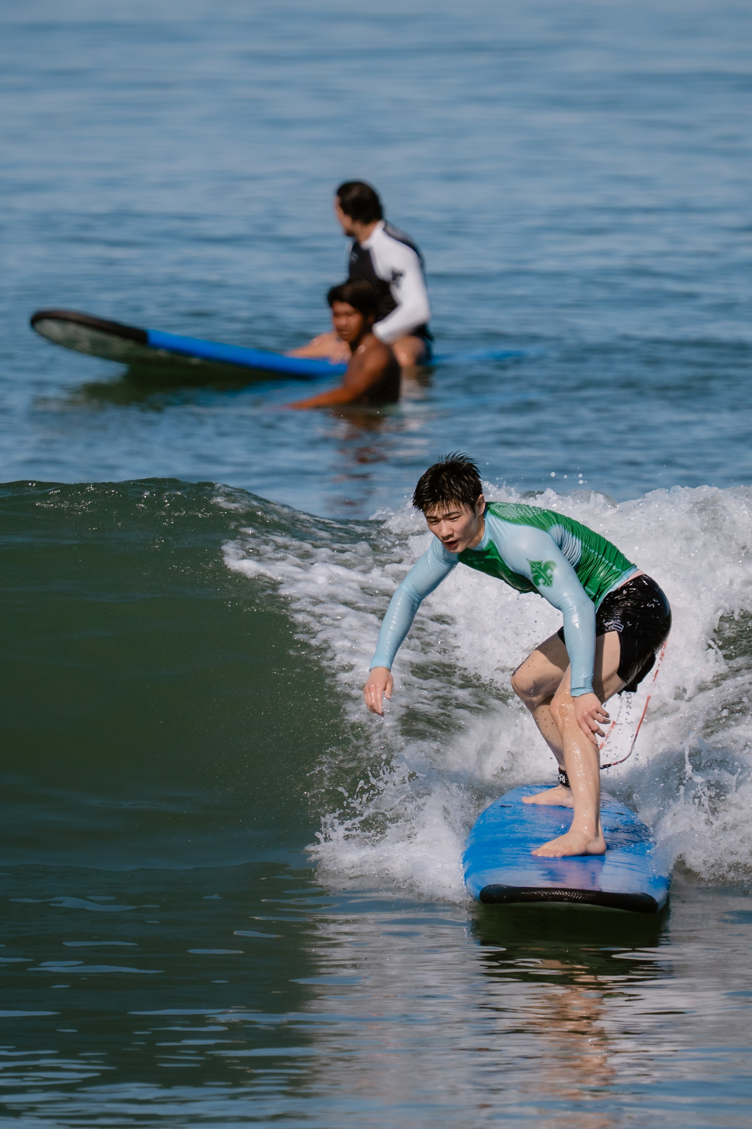 Al Leone athletes having fun surfing in the Pacific Ocean. Сергей Зворыгин