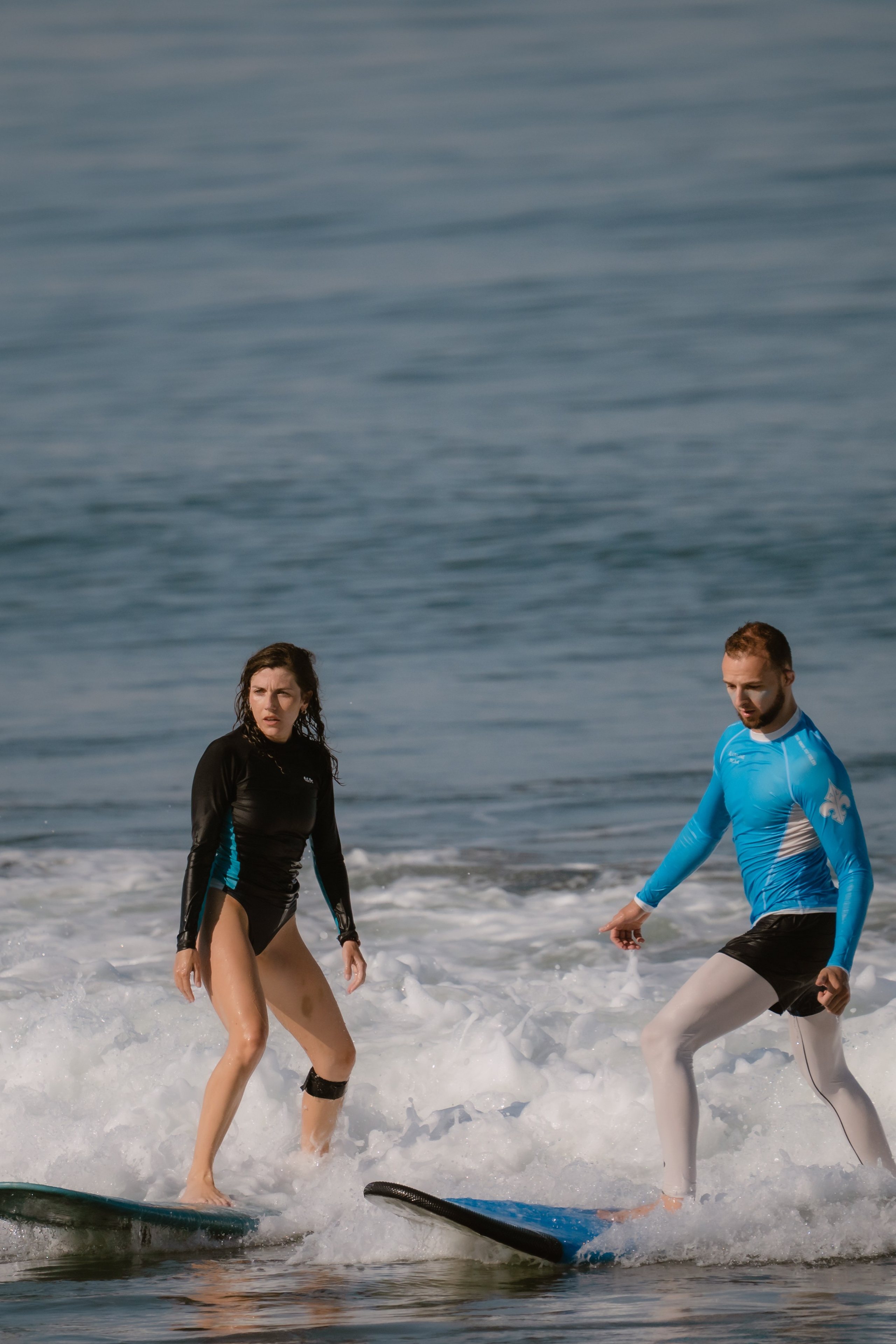 Al Leone athletes having fun surfing in the Pacific Ocean. Сергей Зворыгин