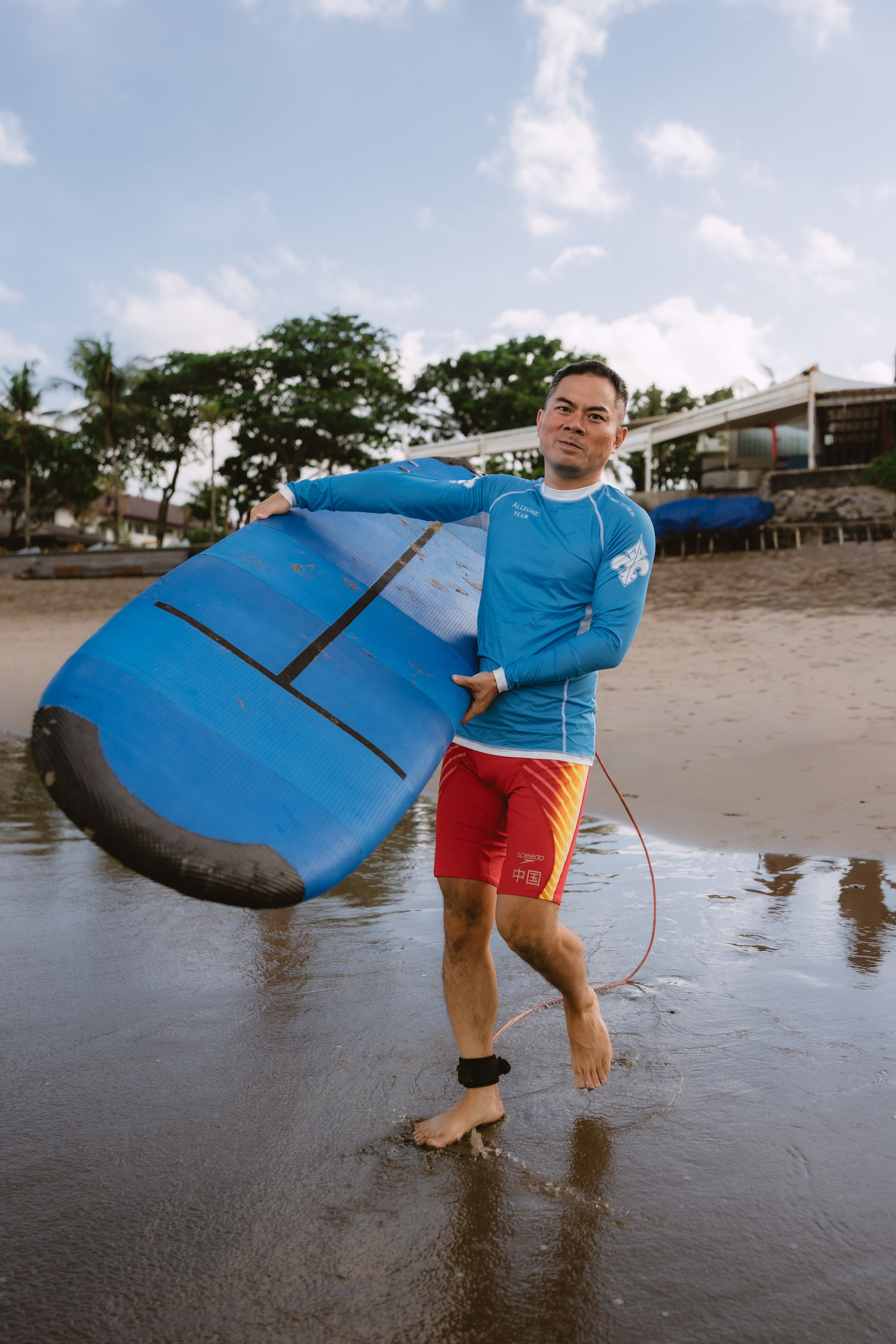 Mixed martial artists having fun surfing at the ocean in between training sessions. Сергей Зворыгин