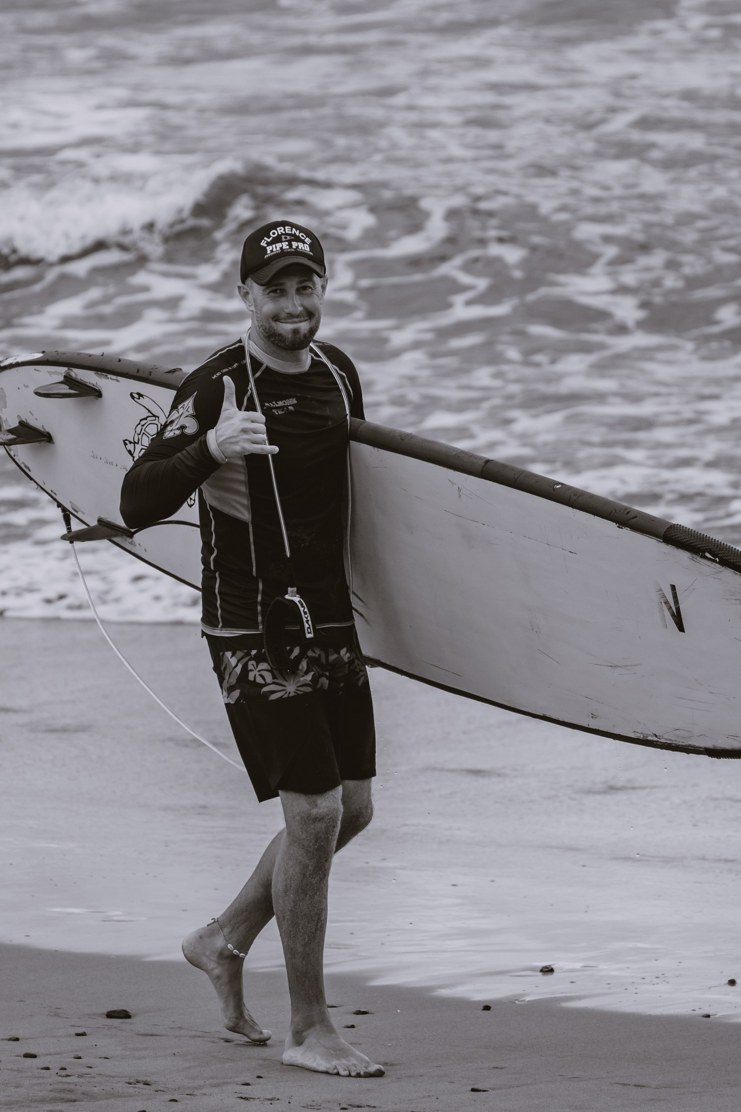 Mixed martial artists having fun surfing at the ocean in between training sessions. Сергей Зворыгин
