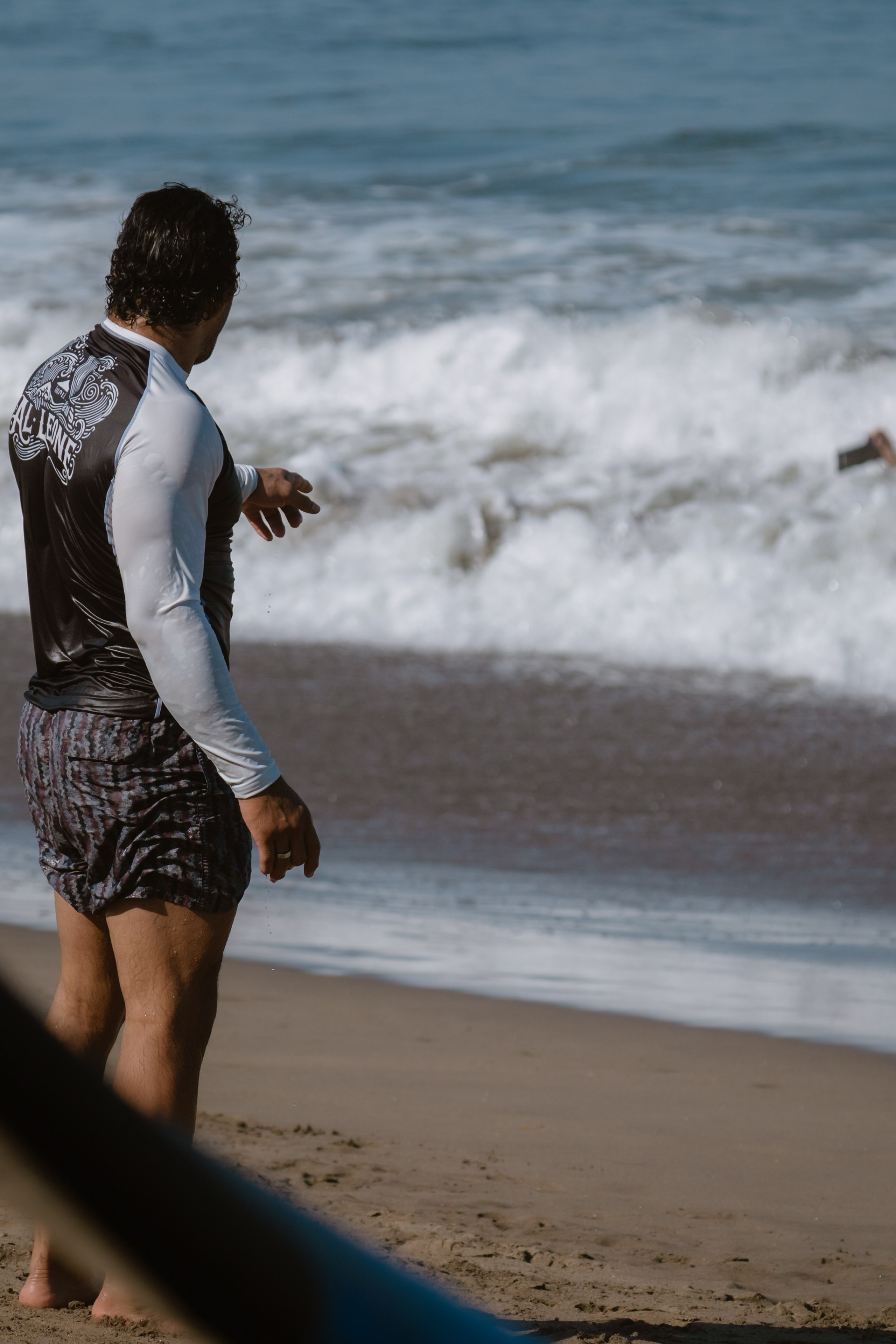 Al Leone athletes having fun surfing in the Pacific Ocean. Сергей Зворыгин