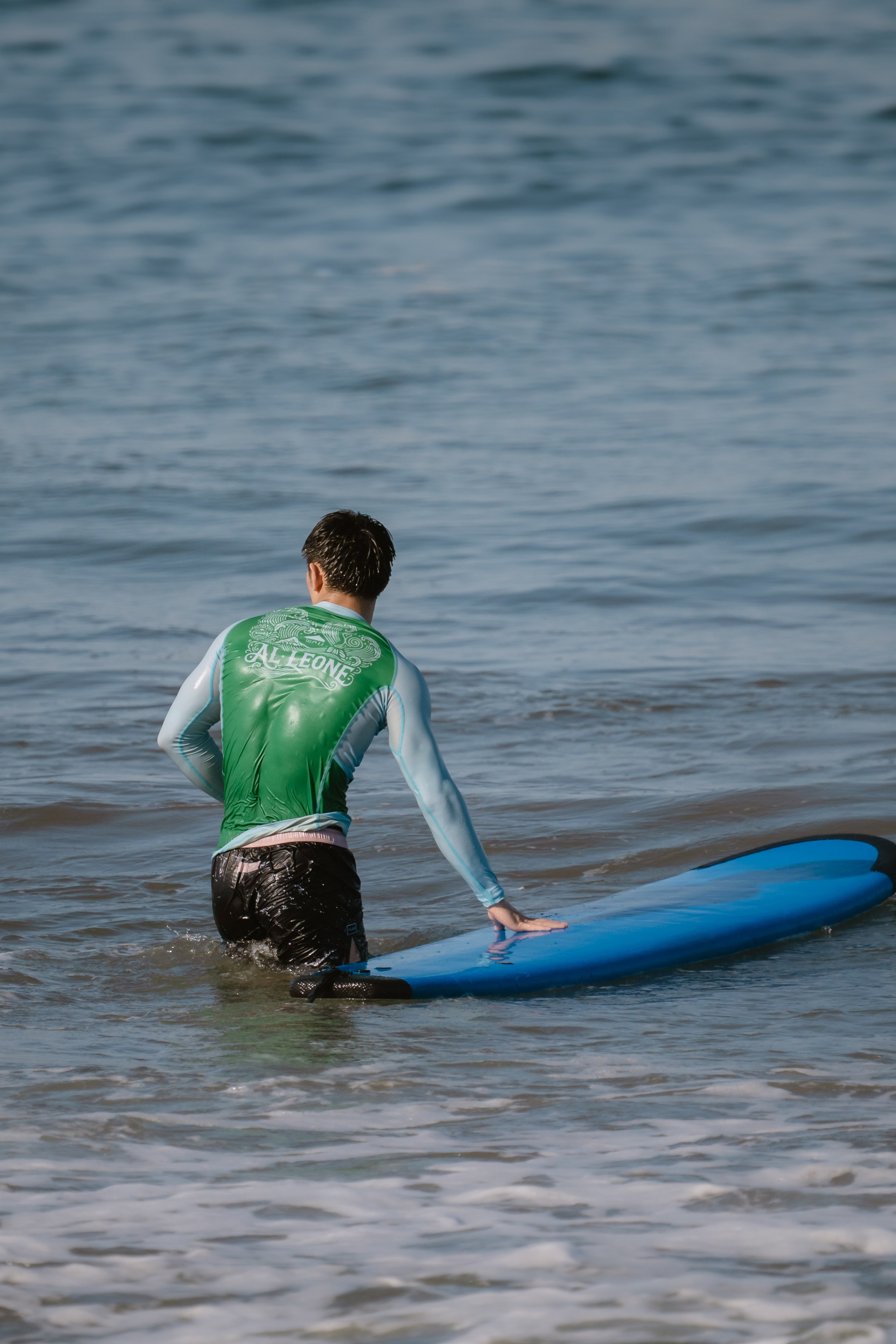 Al Leone athletes having fun surfing in the Pacific Ocean. Сергей Зворыгин