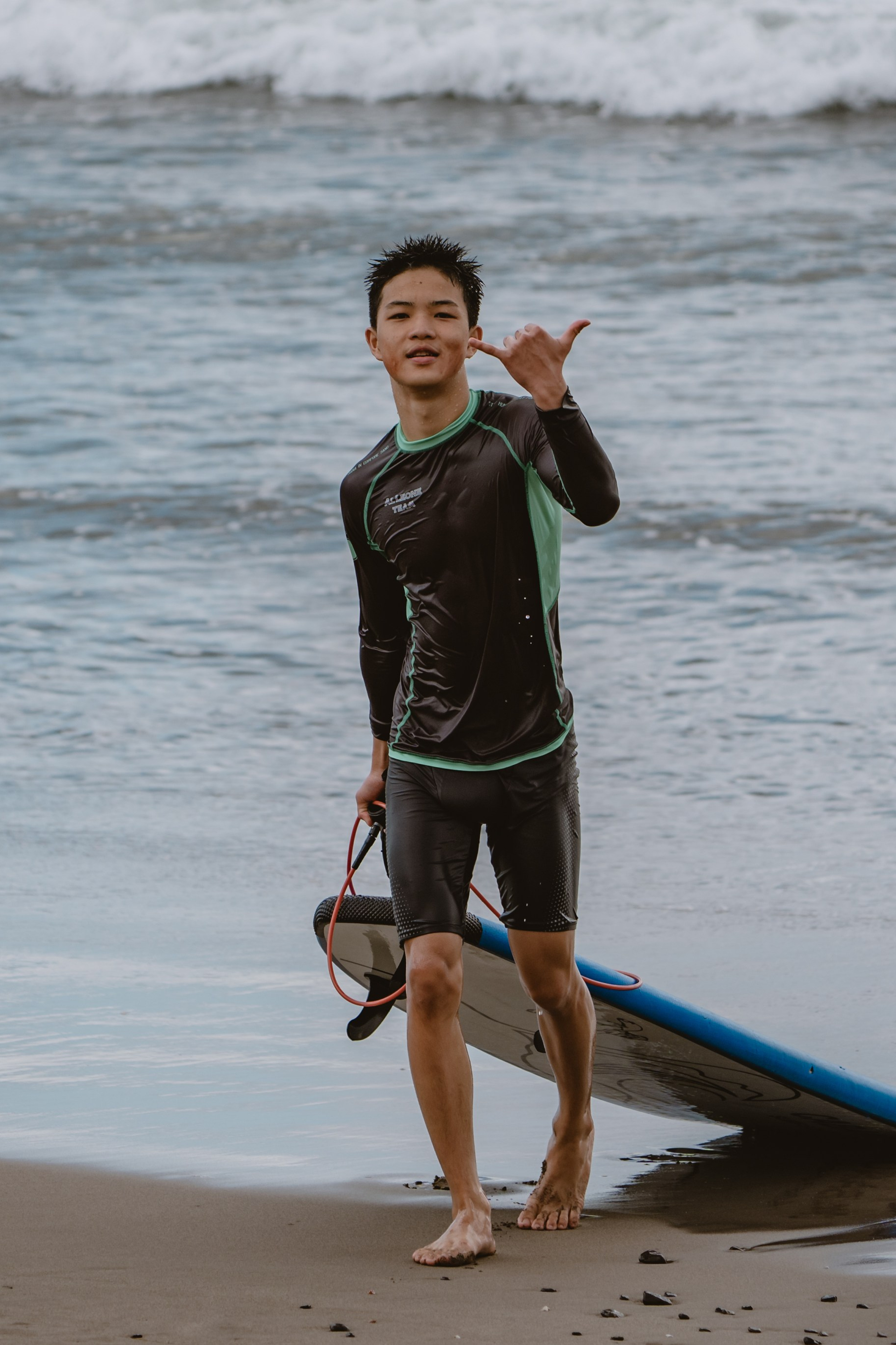 Mixed martial artists having fun surfing at the ocean in between training sessions. Сергей Зворыгин