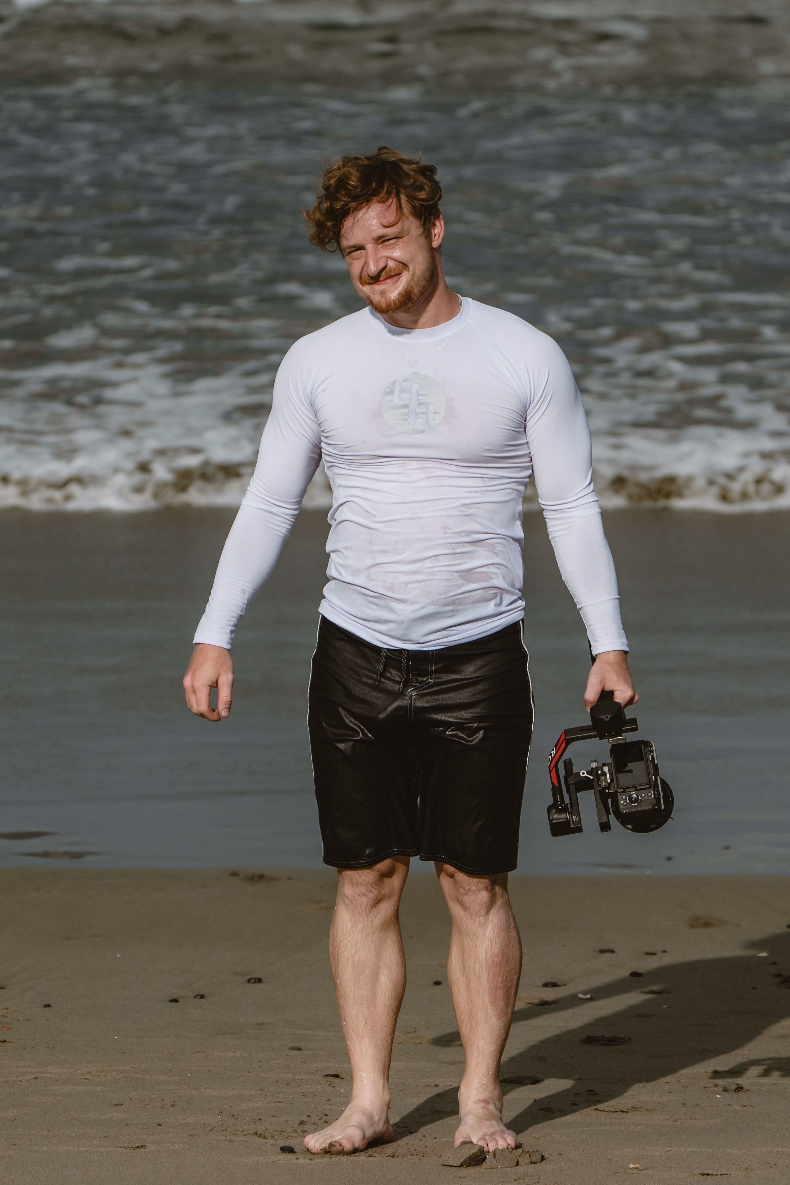 Mixed martial artists having fun surfing at the ocean in between training sessions. Сергей Зворыгин