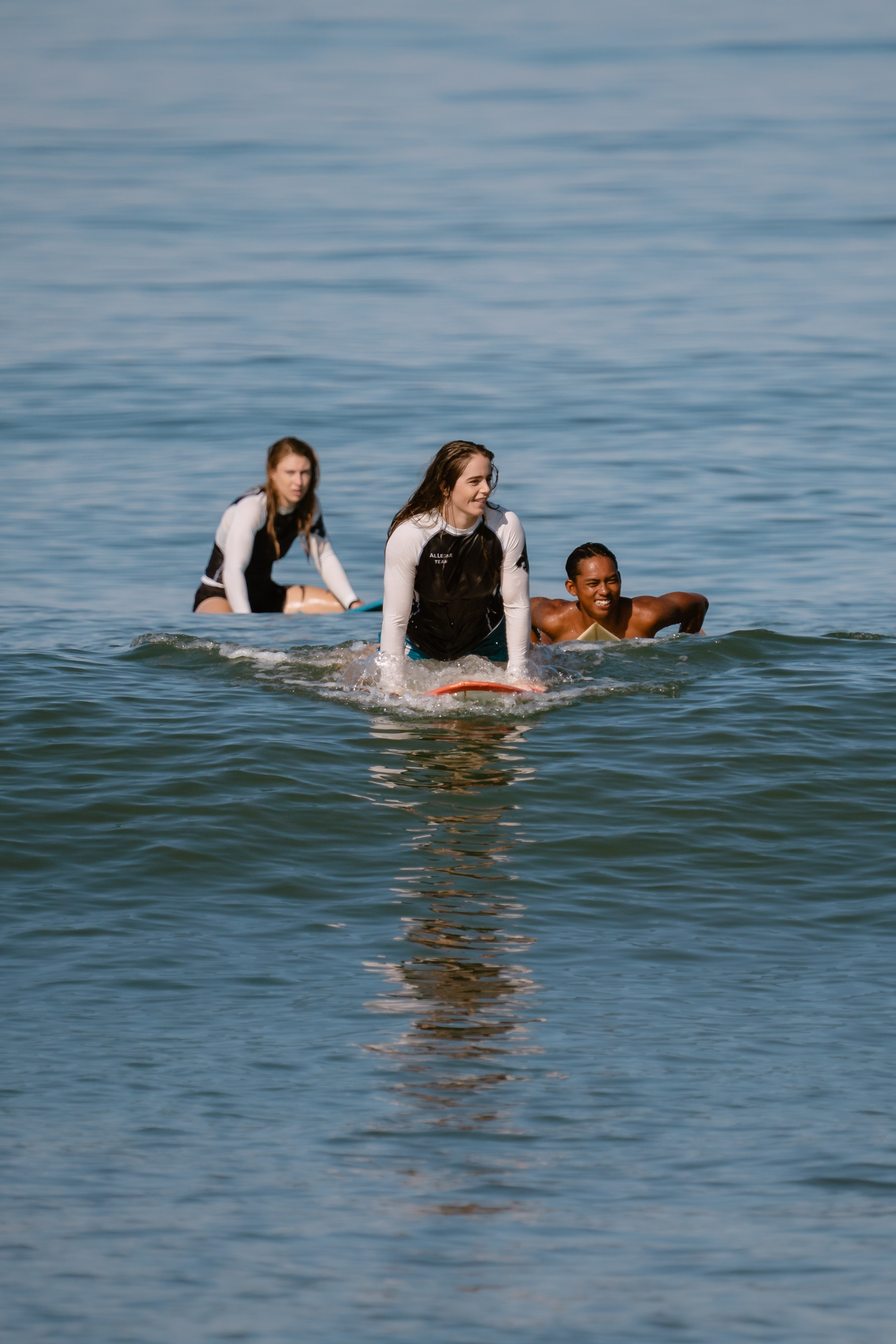 Al Leone athletes having fun surfing in the Pacific Ocean. Сергей Зворыгин