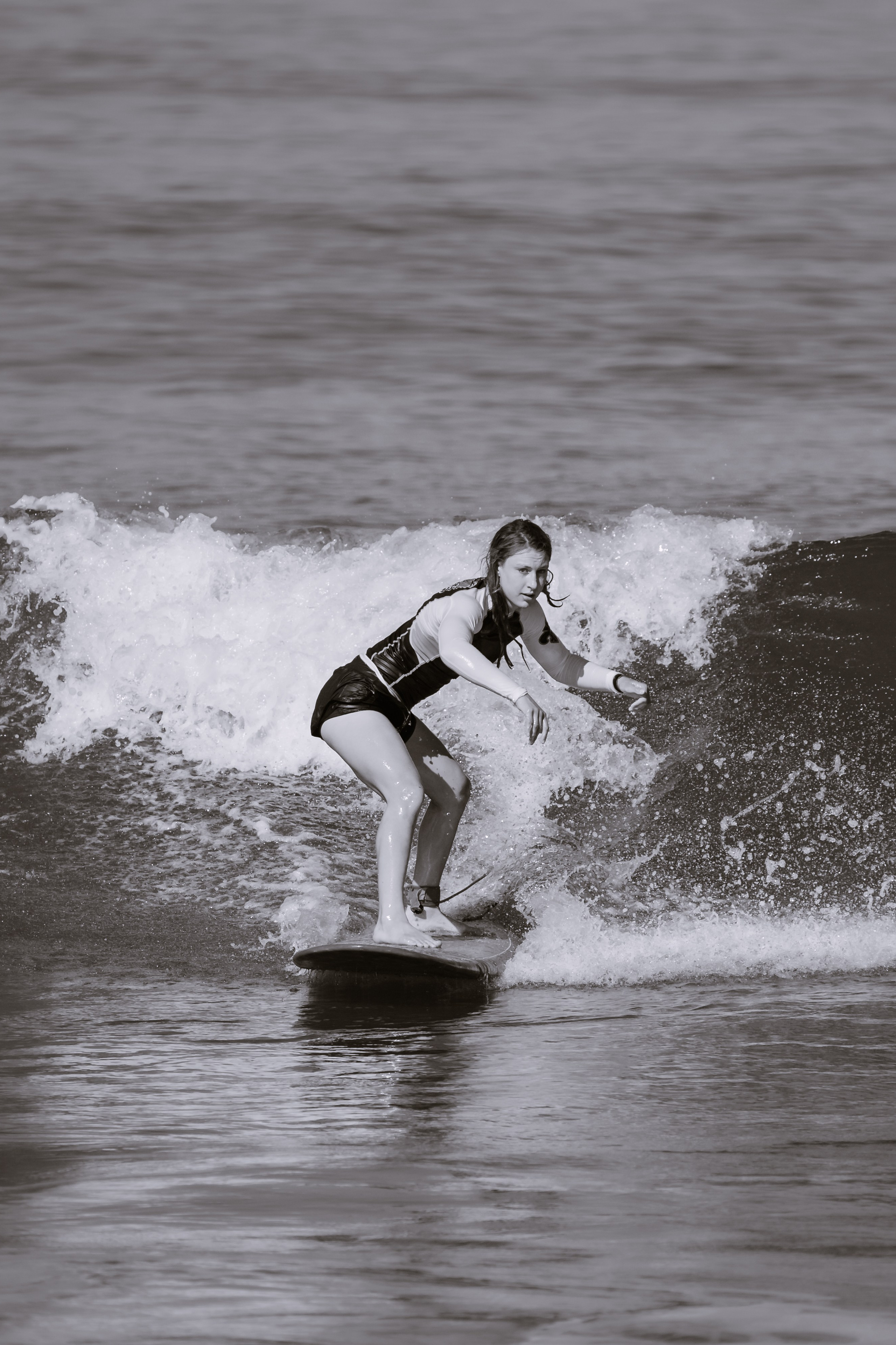 Al Leone athletes having fun surfing in the Pacific Ocean. Сергей Зворыгин